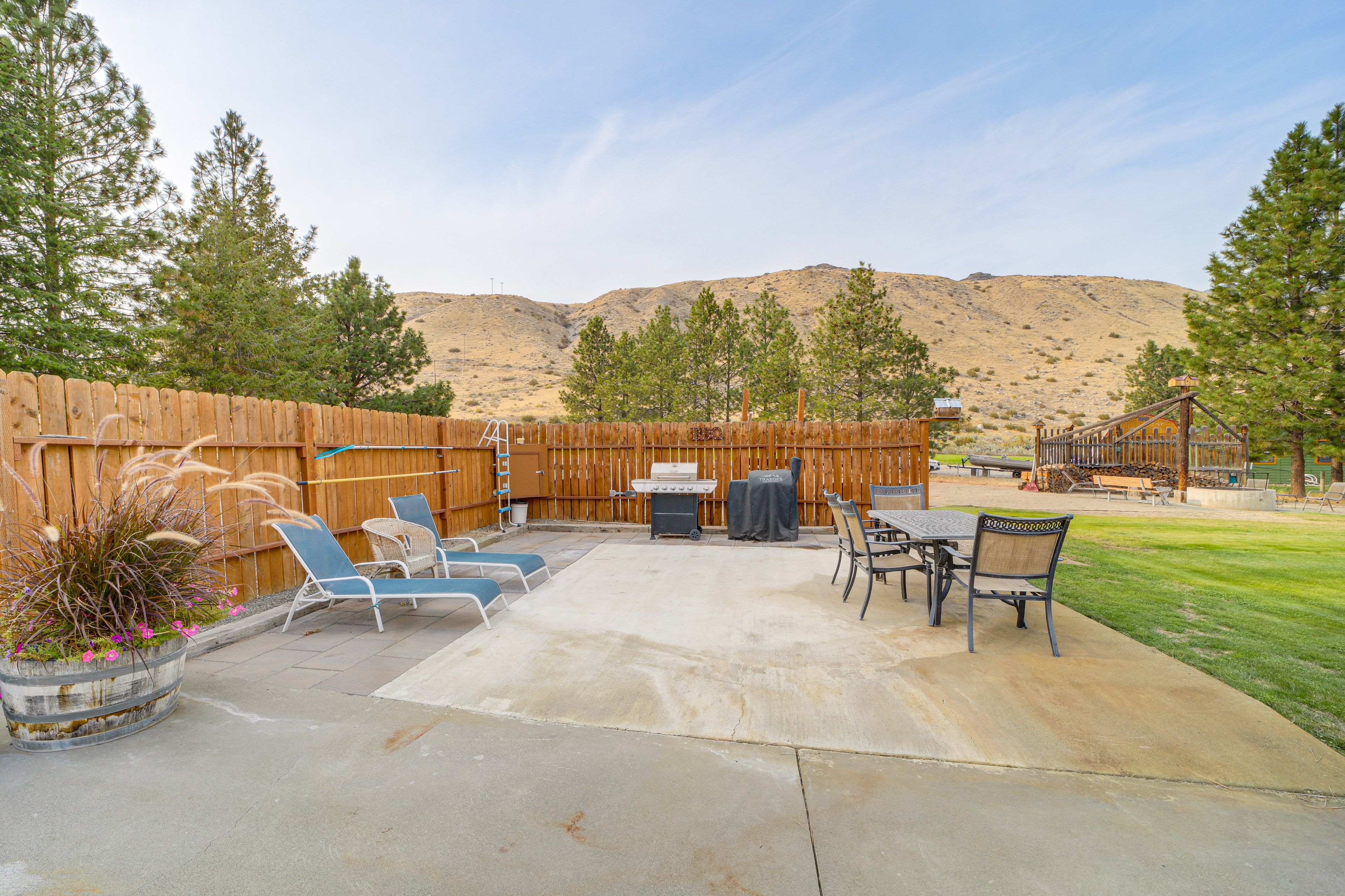 Exterior | Patio w/ Dining Area & Lounge Chairs | Gas & Charcoal Grills