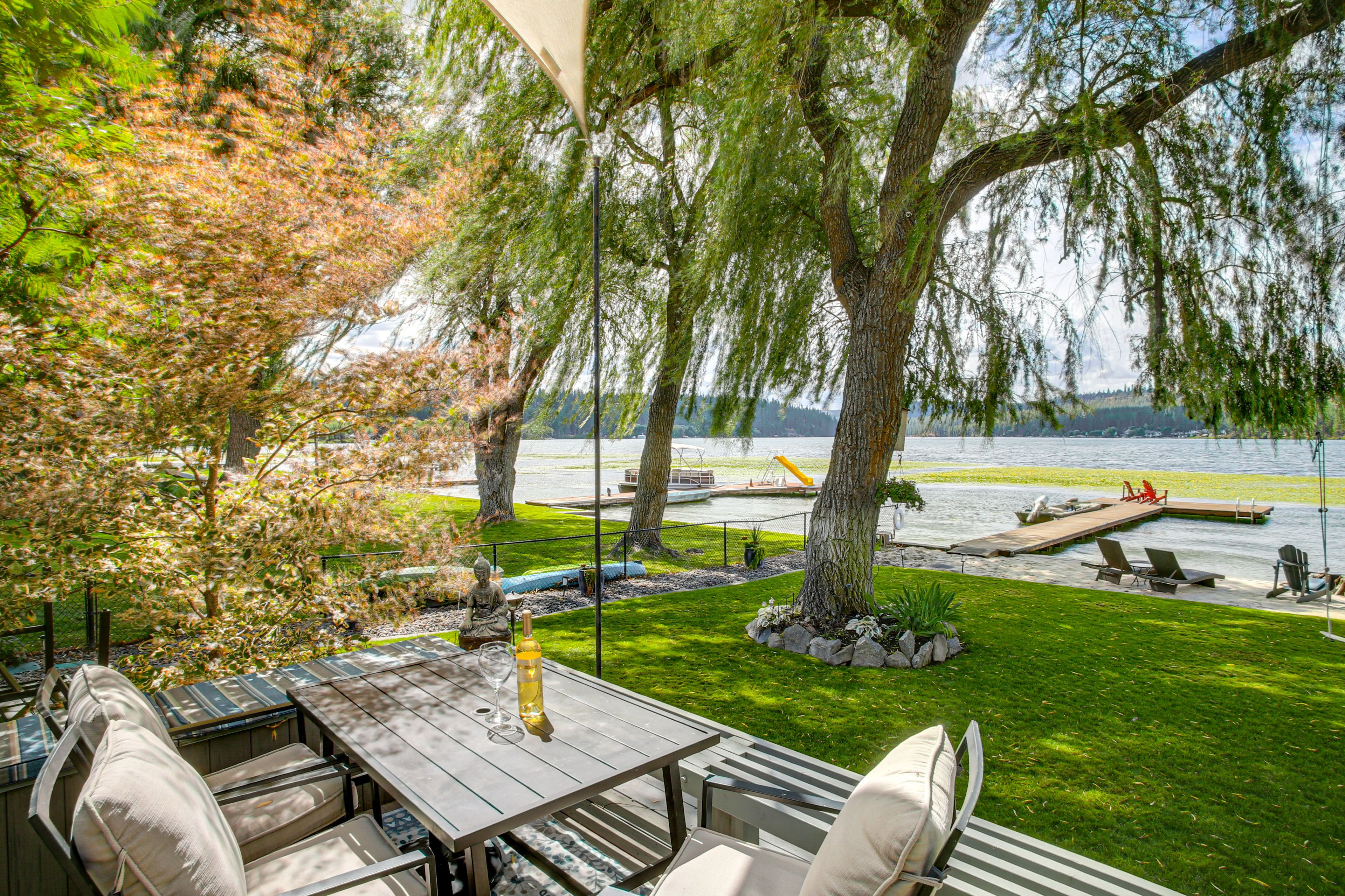 House Exterior | Furnished Deck | Dining Area | Lake Views