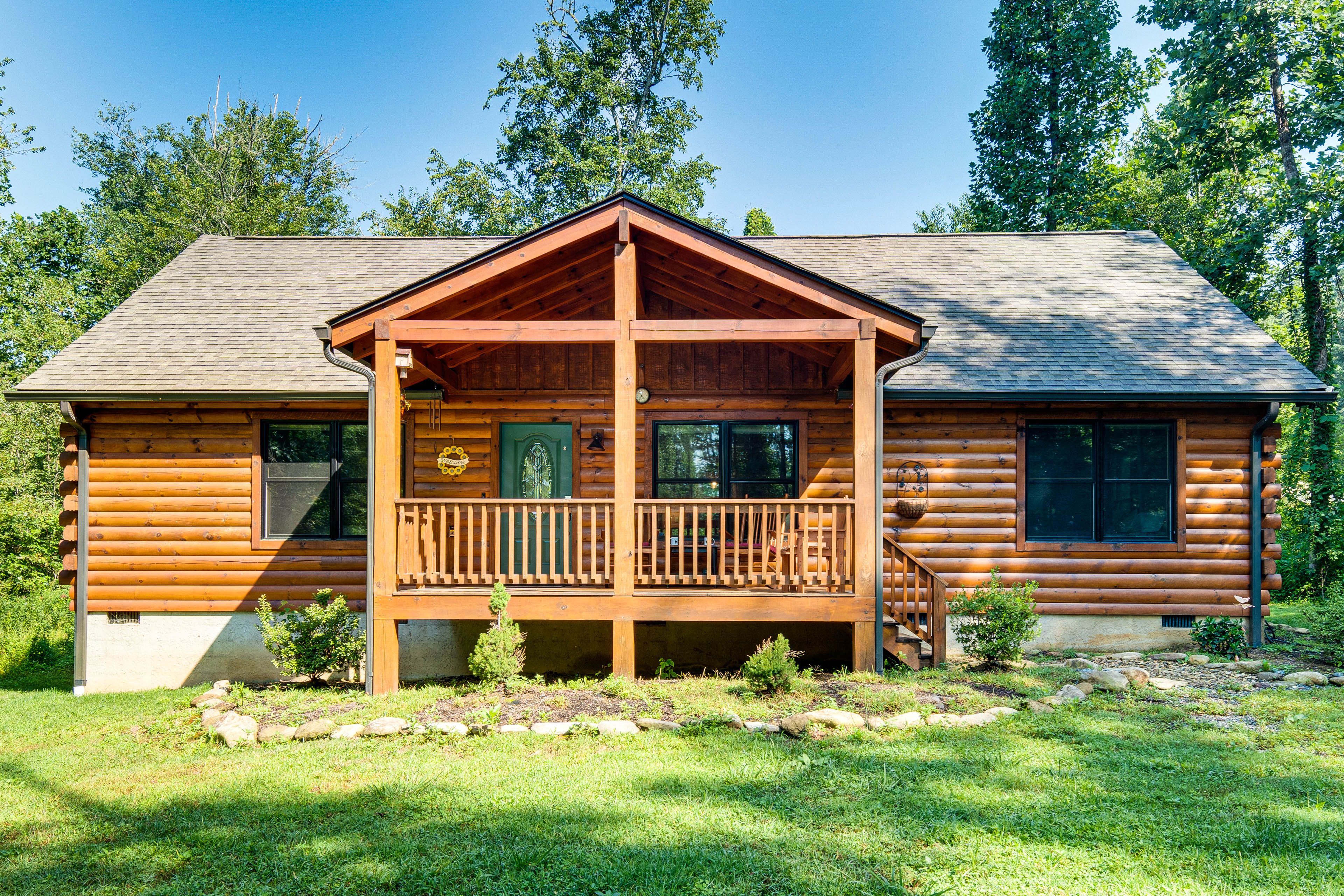 Property Exterior | Covered Porch & Deck w/ Seating | Spacious Yard