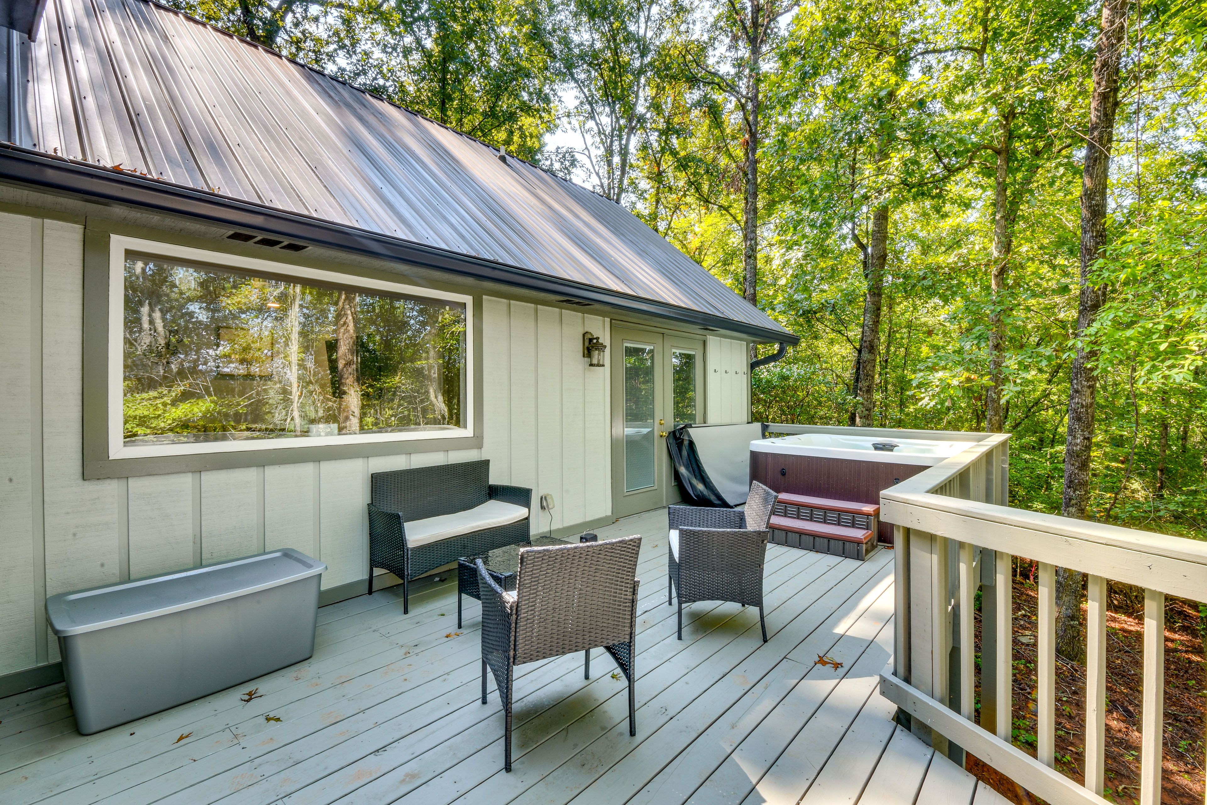 House Exterior | Wraparound Deck w/ Seating | Private Hot Tub
