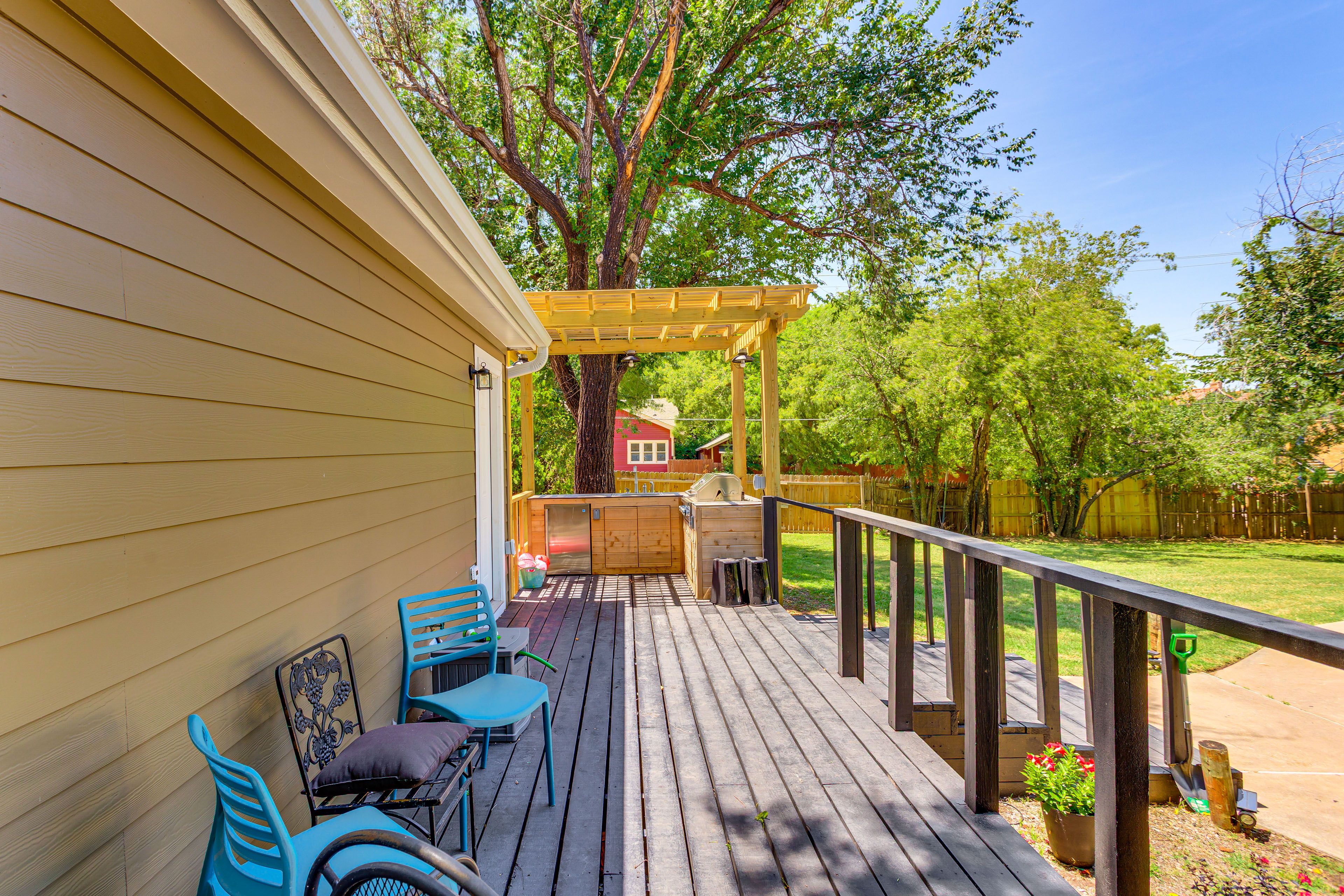 Deck w/ Seating | Outdoor Kitchen Area w/ Gas Grill