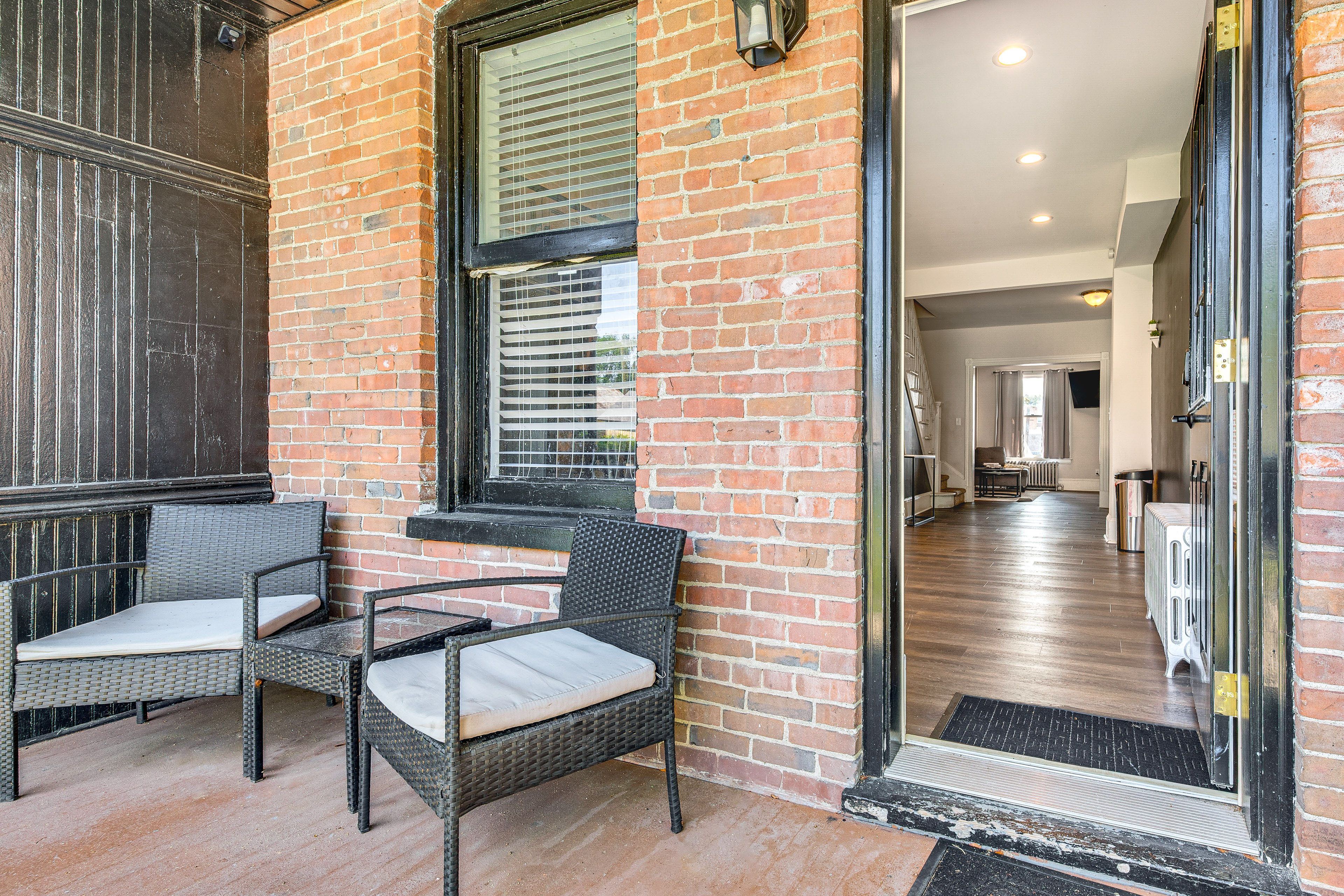 Front Porch w/ Seating | Surface Lot Parking