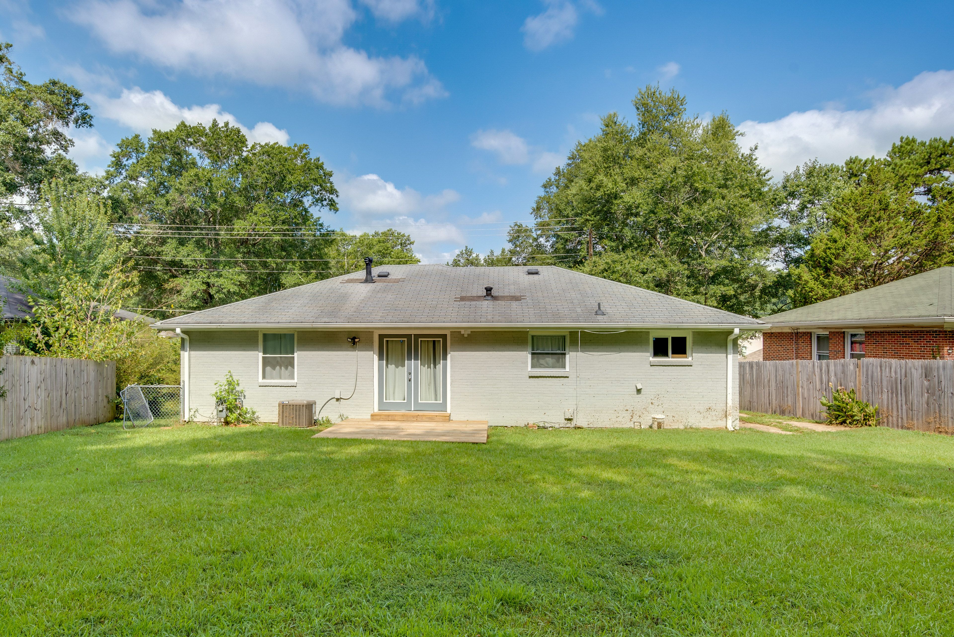 House Exterior | Partially Fenced Backyard