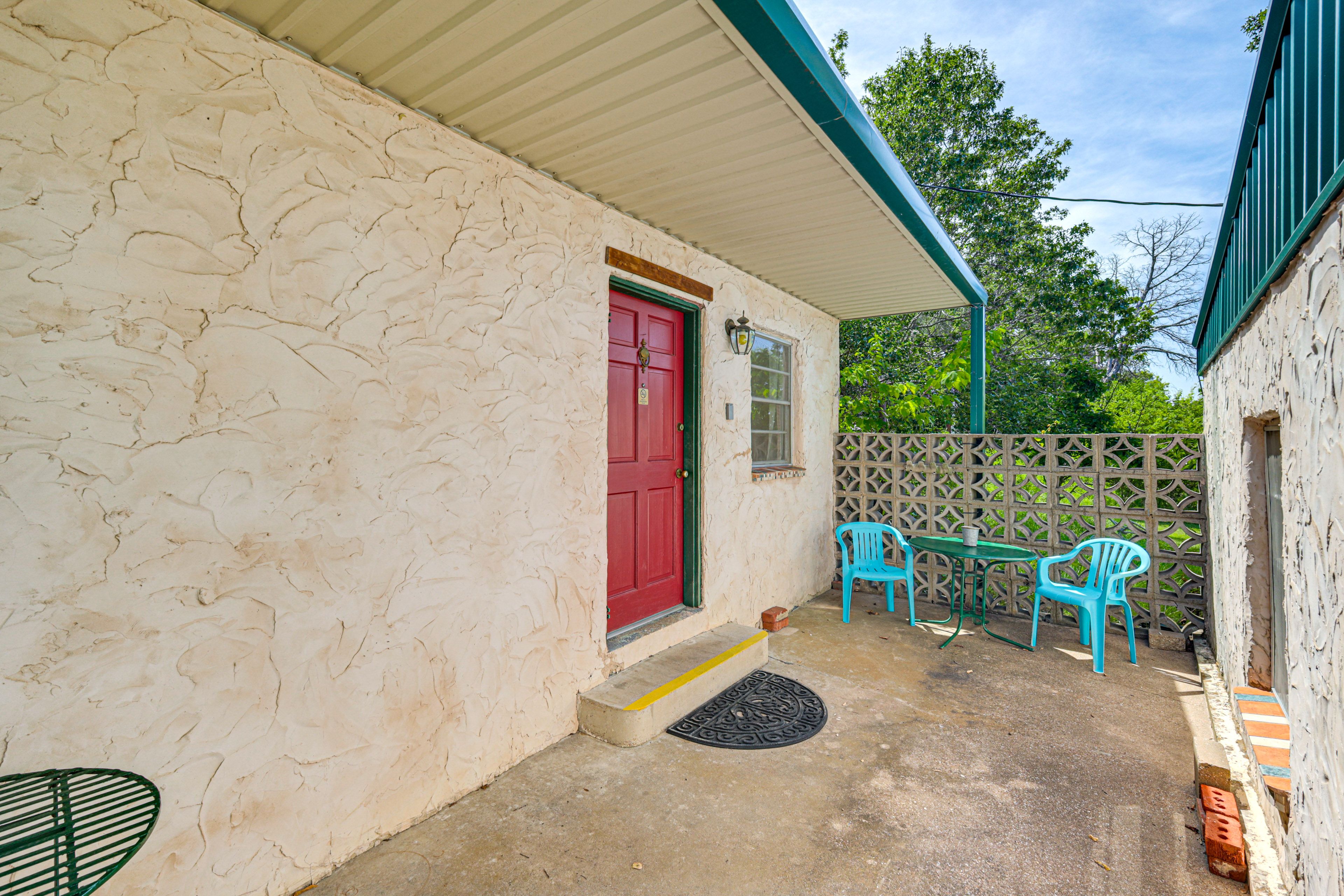 Studio Exterior | Shared Patio w/ Dining Areas