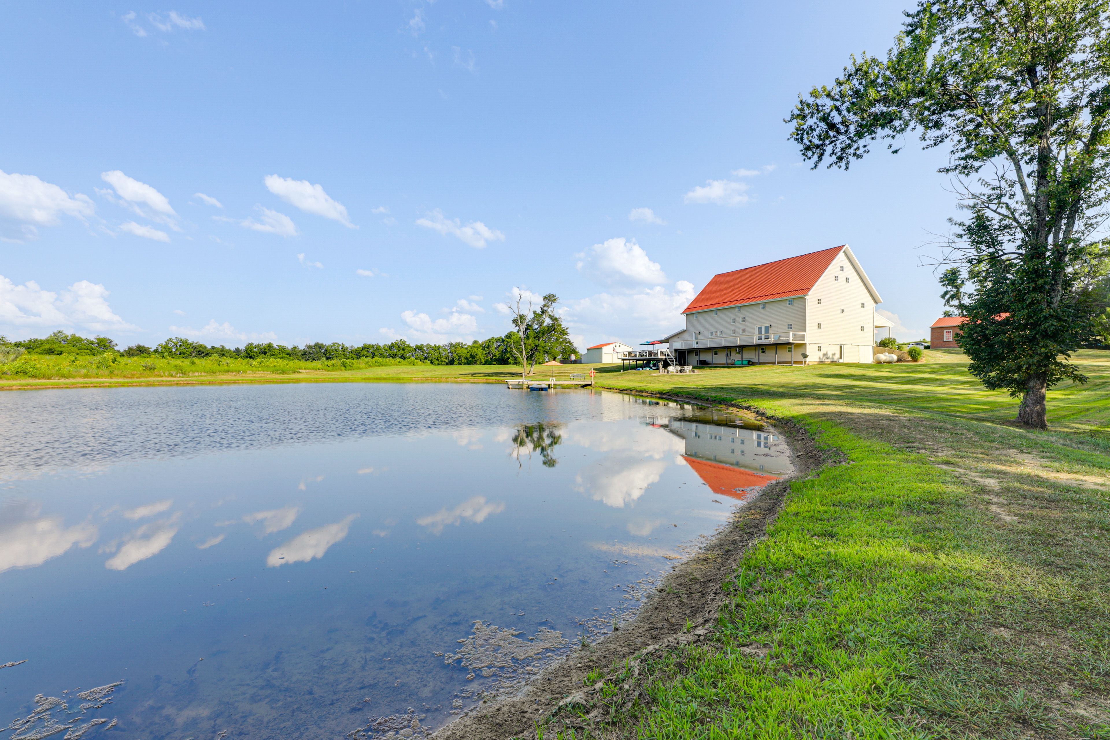 Property Exterior | Dock w/ Slide | 4 Fire Pits | 2 Grills | Kayaks