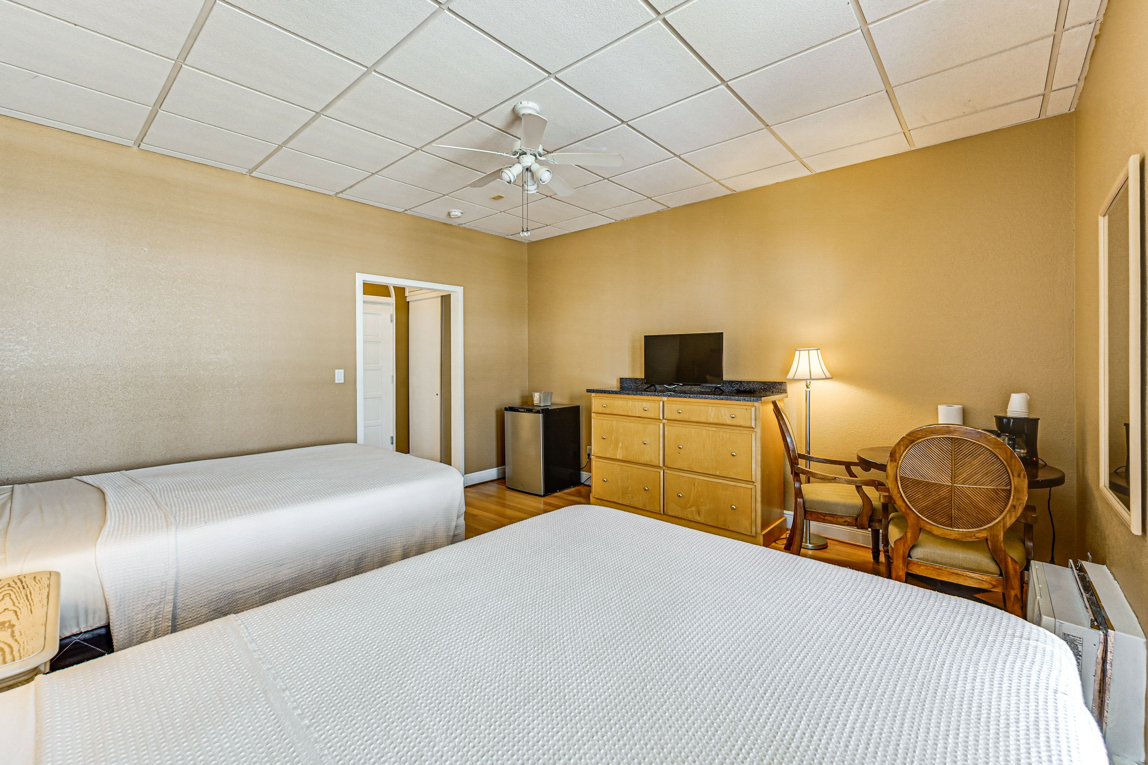 Studio | 2 Queen Beds | Free WiFi | Window A/C Unit | Central Heat