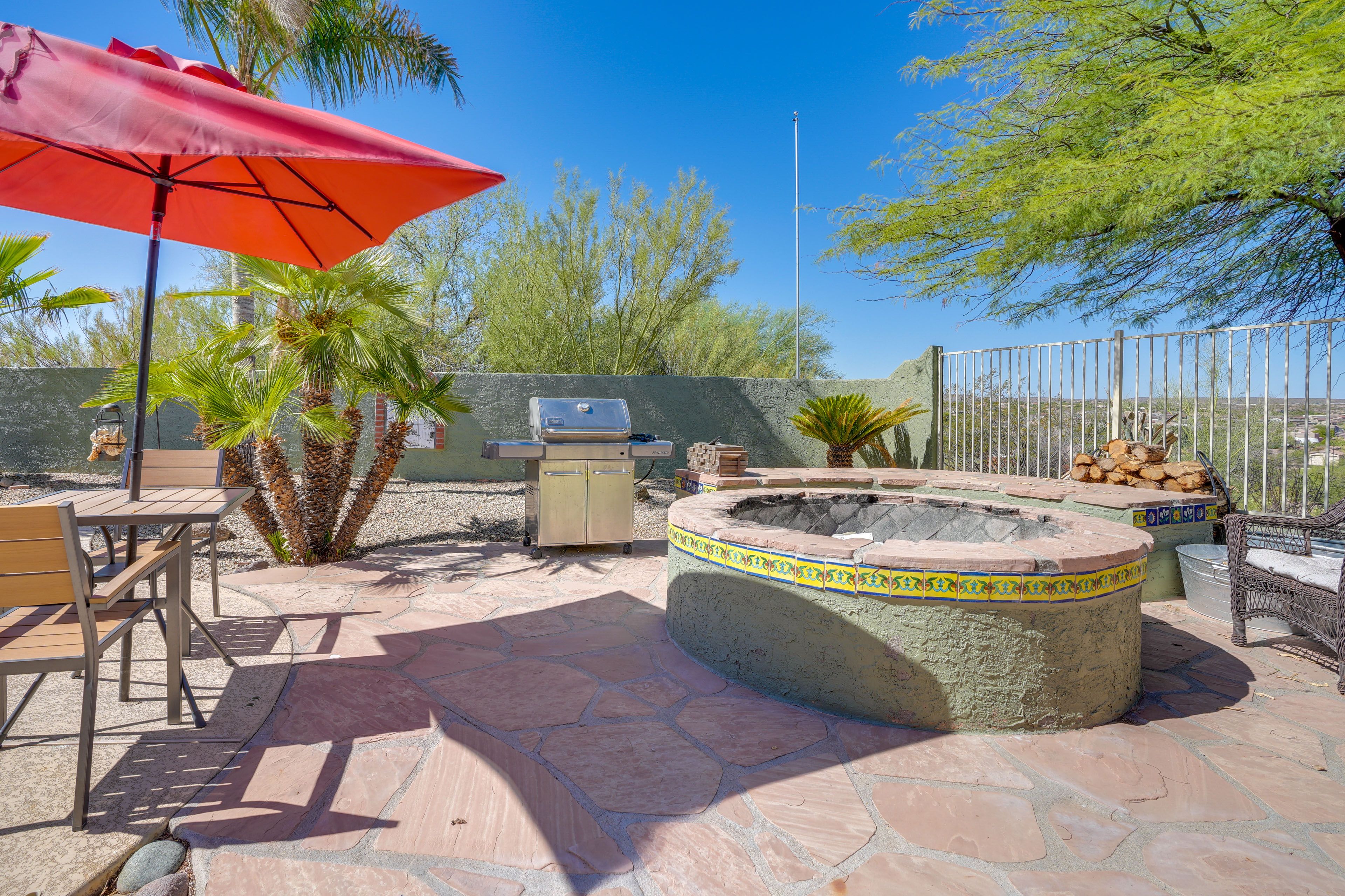 Fenced Backyard | Mountain Views | Dining Areas | Fire Pit | Gas Grill