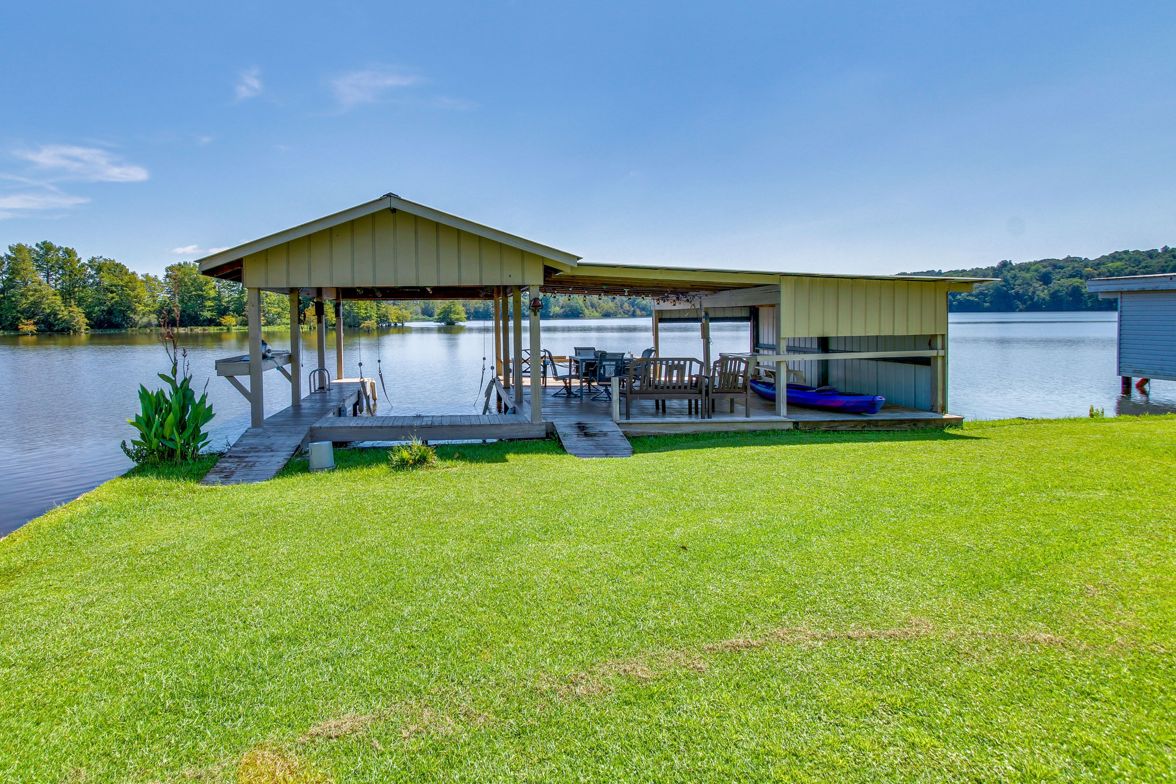 Private Dock & Boat Lift | Waterfront Dining Area