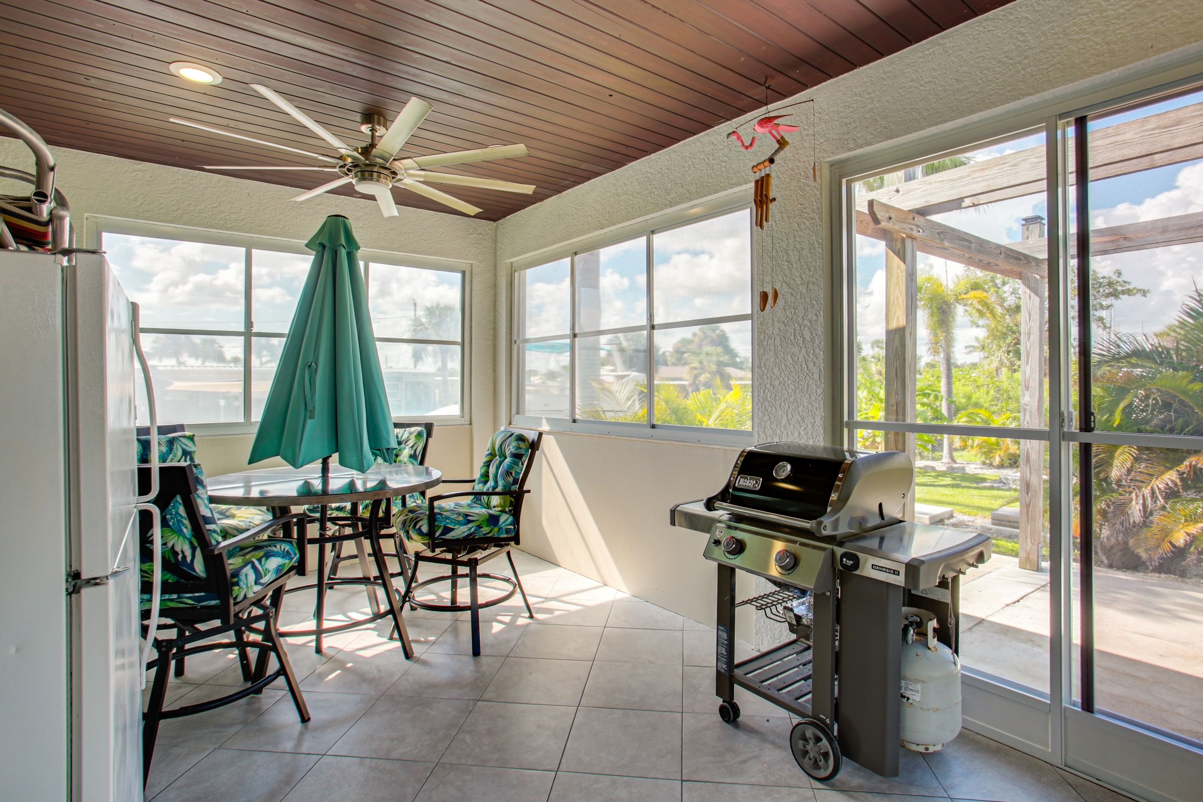 Sunroom | Outdoor Dining Area | Refrigerator