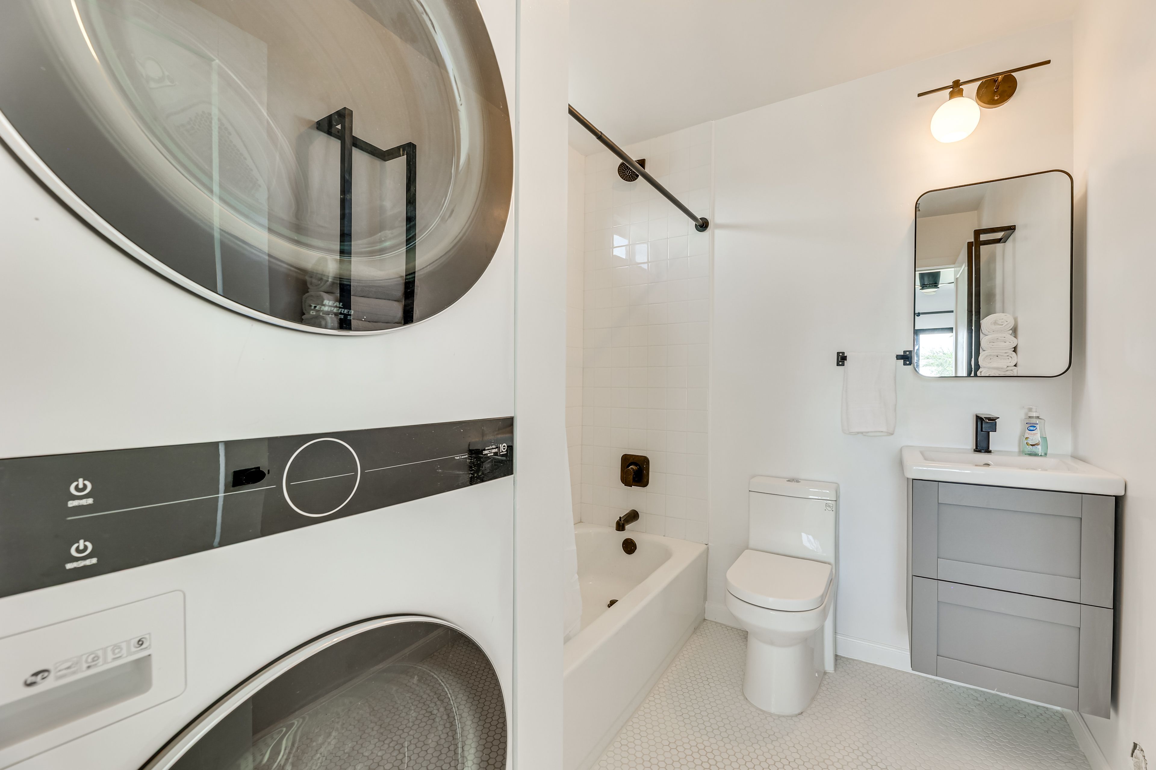 En-Suite Bathroom | In-Unit Laundry | Detergent | Iron & Board
