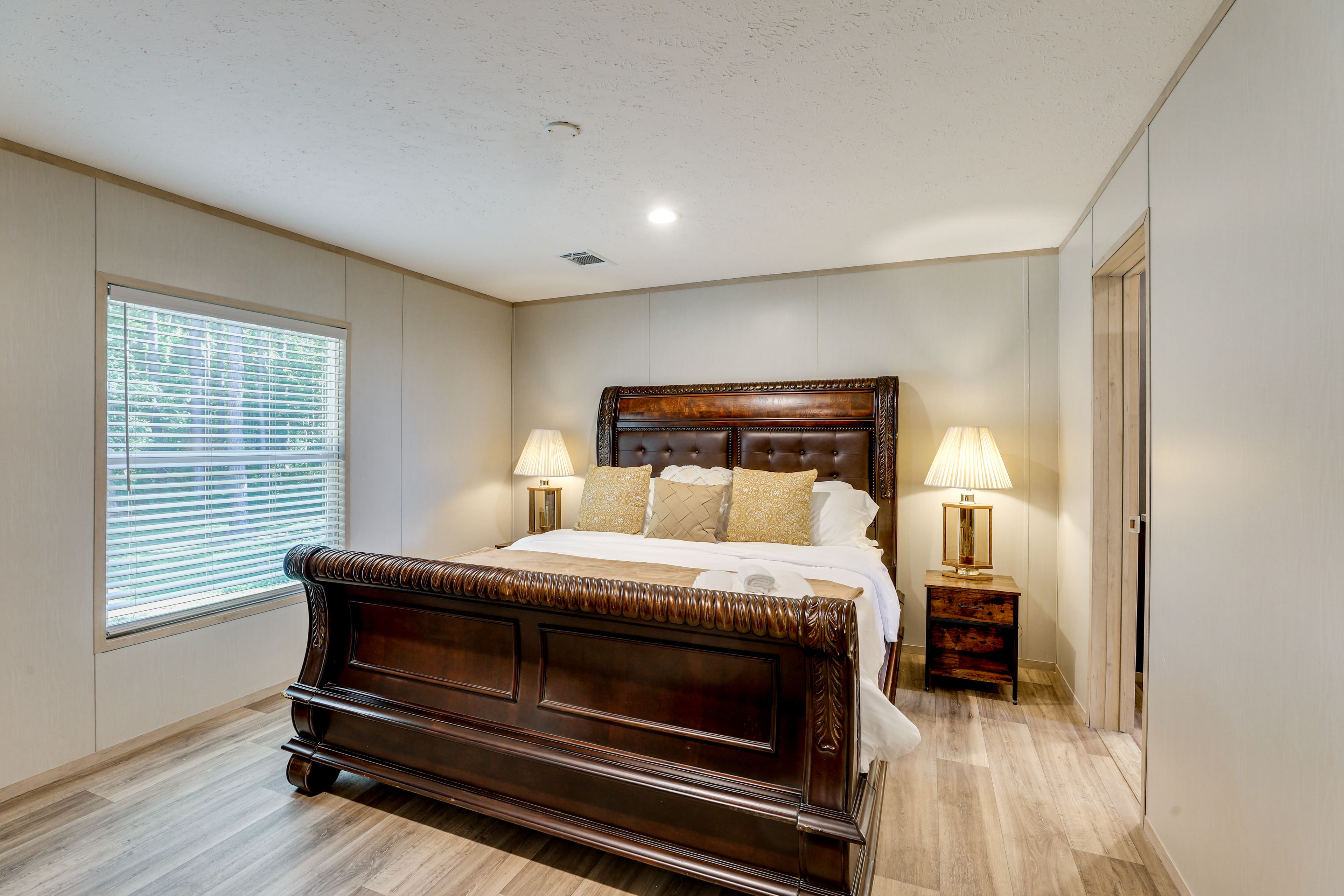 Bedroom 1 | King Bed | Flat-Screen TV | Linens Provided