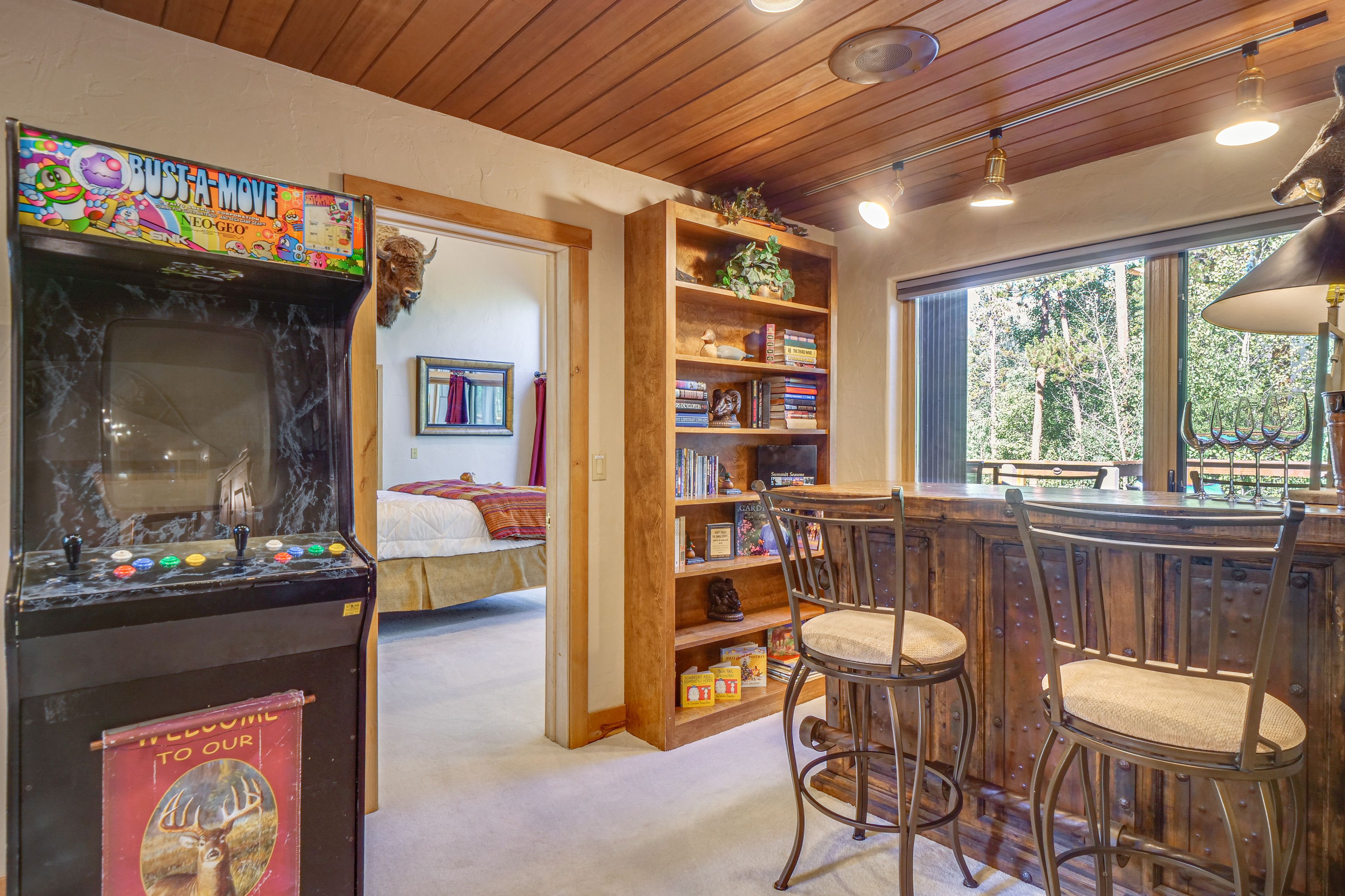 Lounge Area | Arcade Machine | Books | Bar