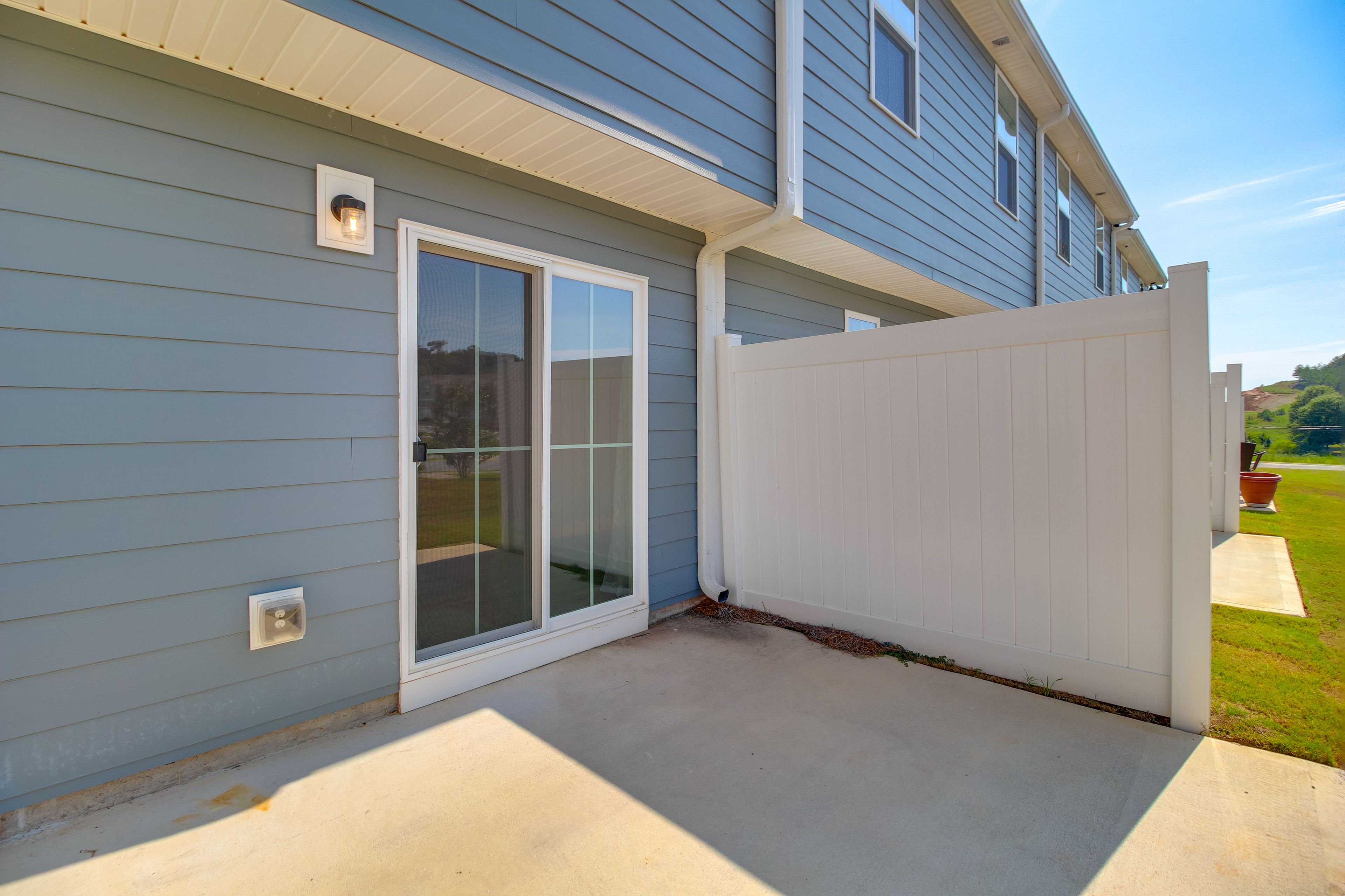 Property Exterior | Private Patio | Communal Yard