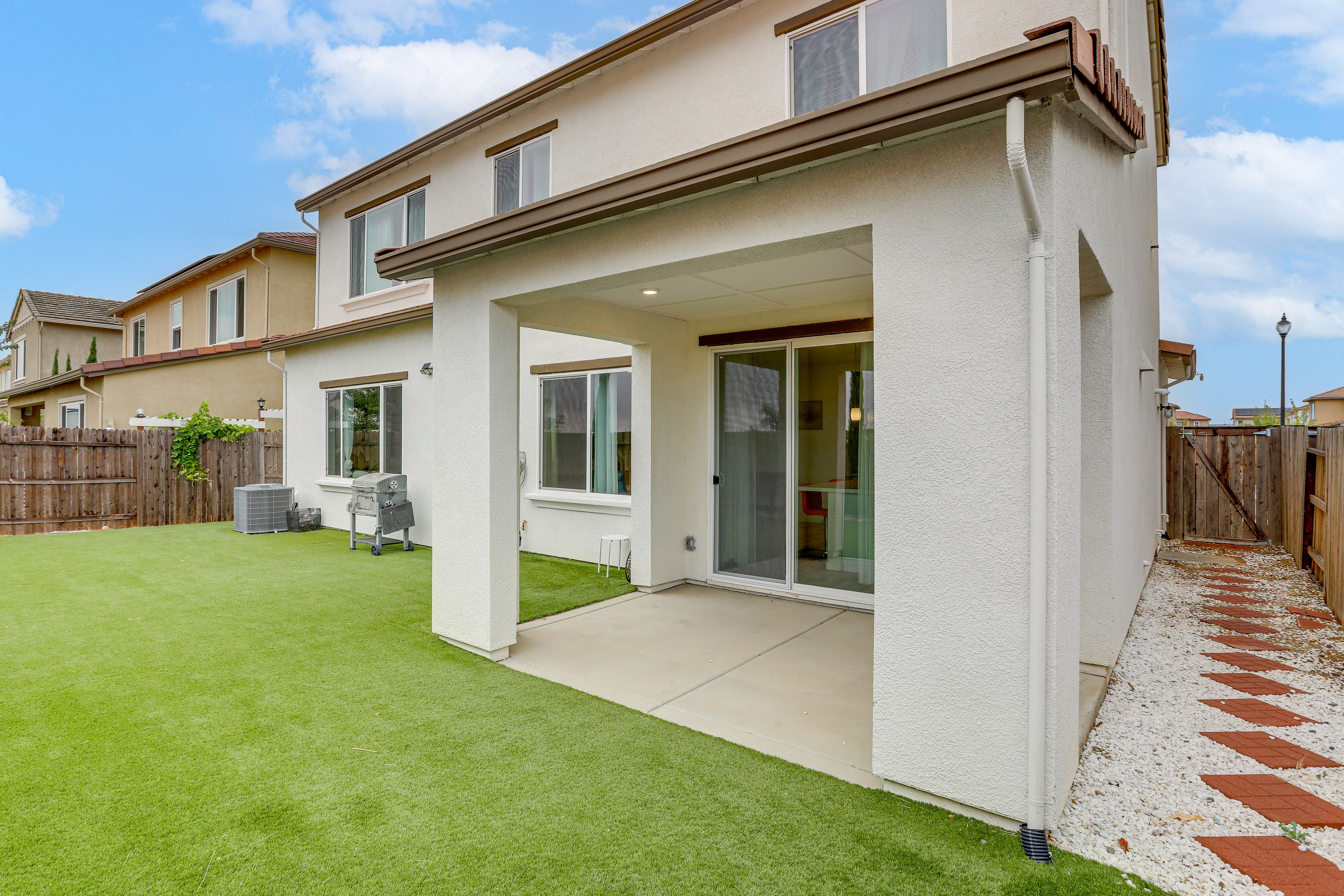Covered Patio | Fenced-In Yard | Charcoal Grill
