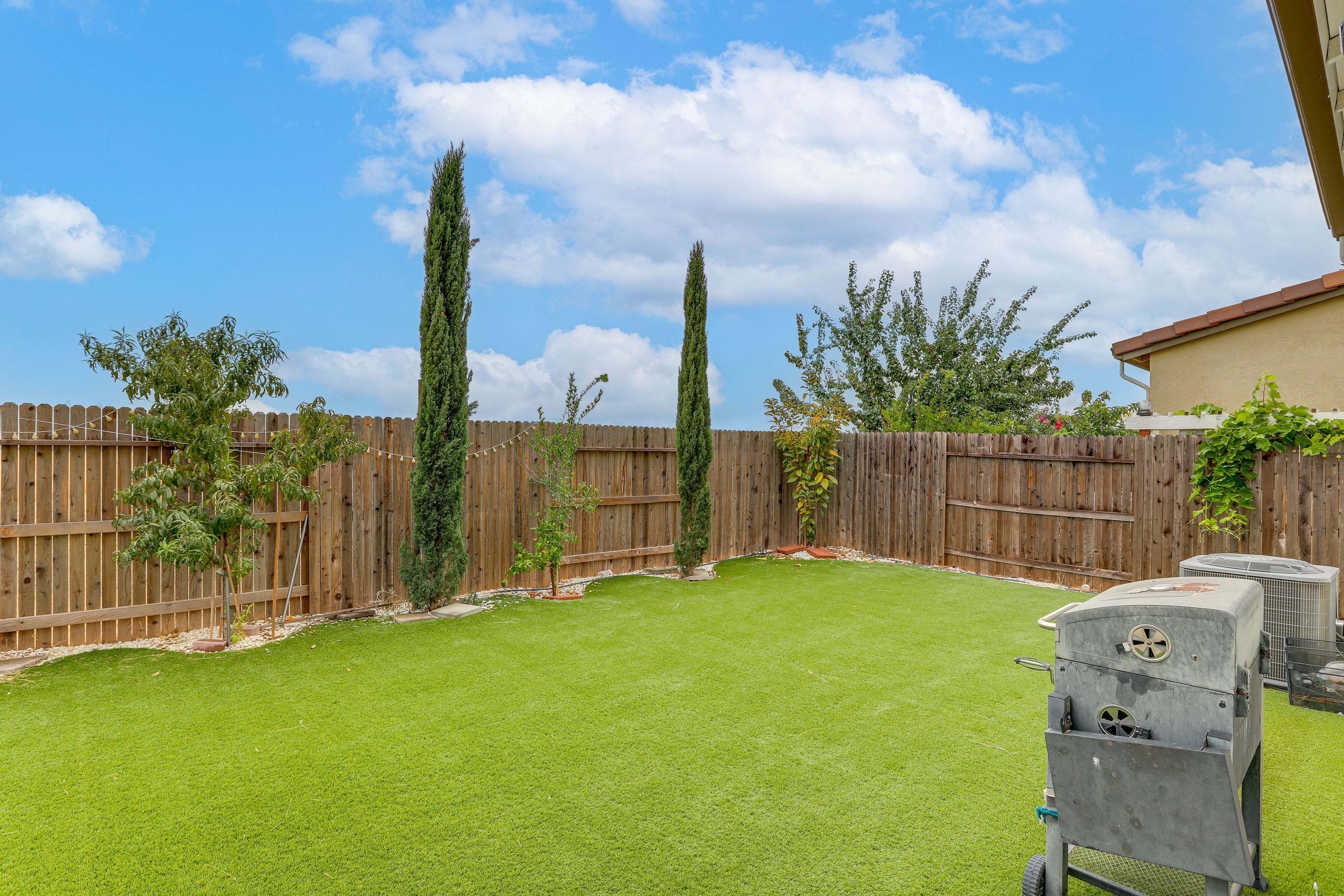 Fenced-In Yard | Covered Patio | Charcoal Grill