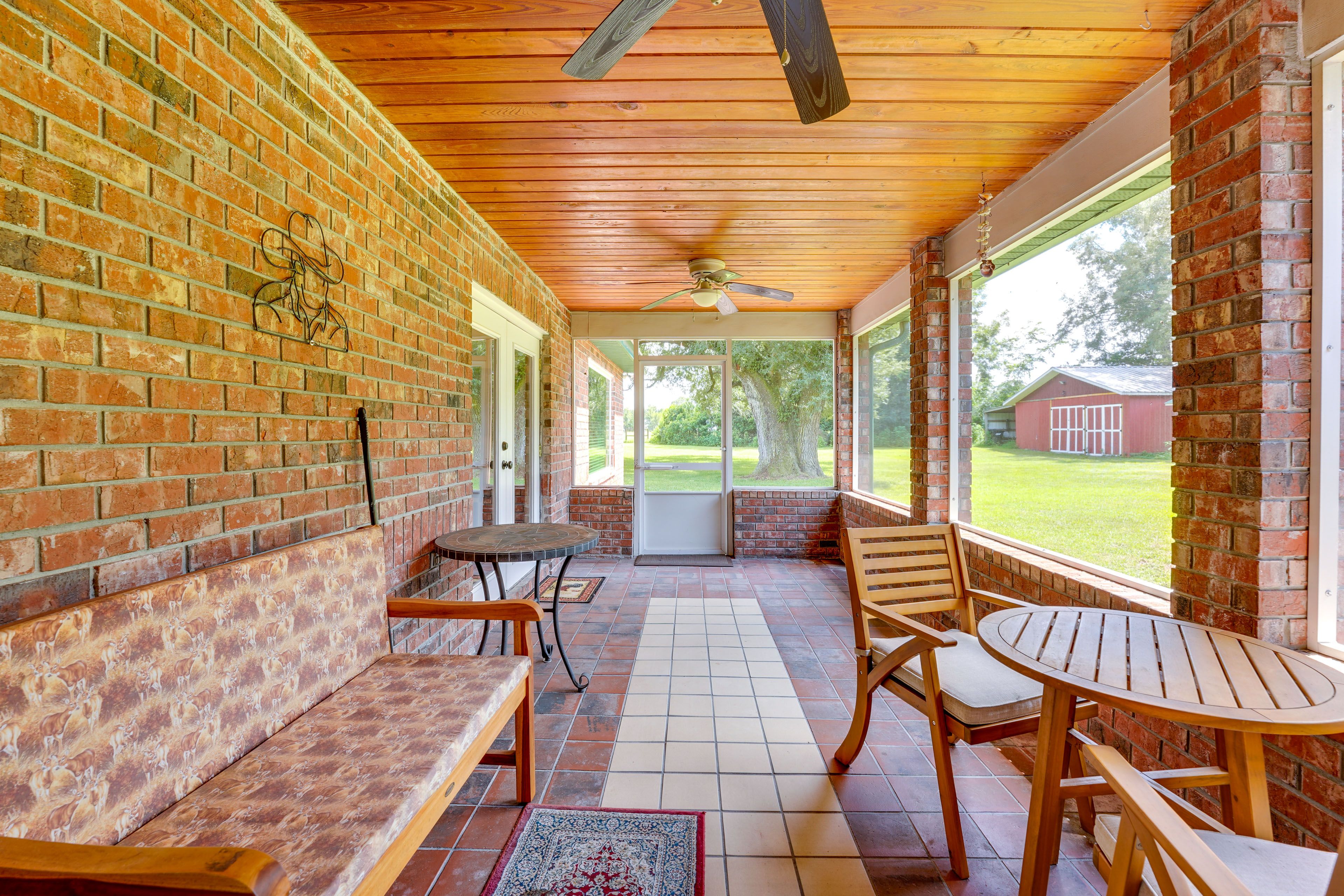 House Exterior | Screened Porch | Dining Area