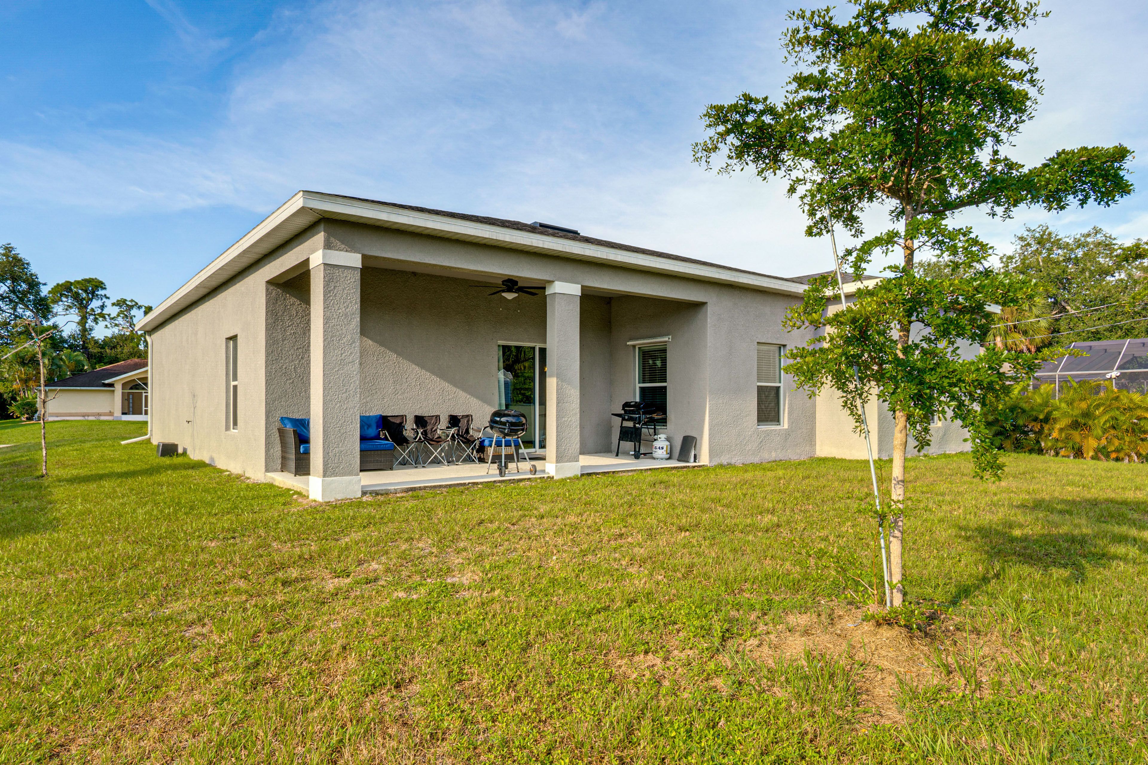 Covered Patio | Gas Grill | Charcoal Grill | Outdoor Seating | Yard Space