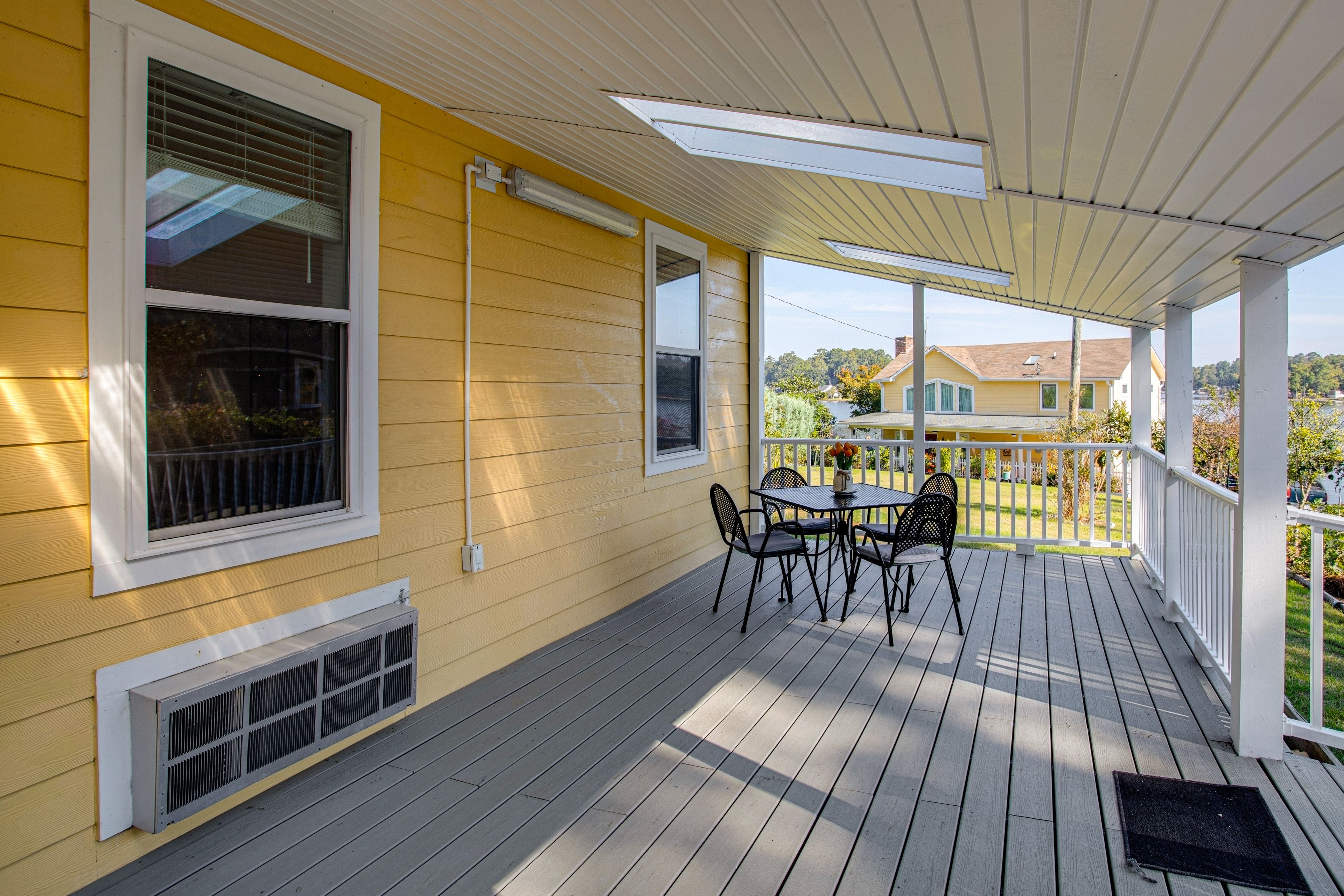 House Exterior | Covered Porch w/ Dining Area