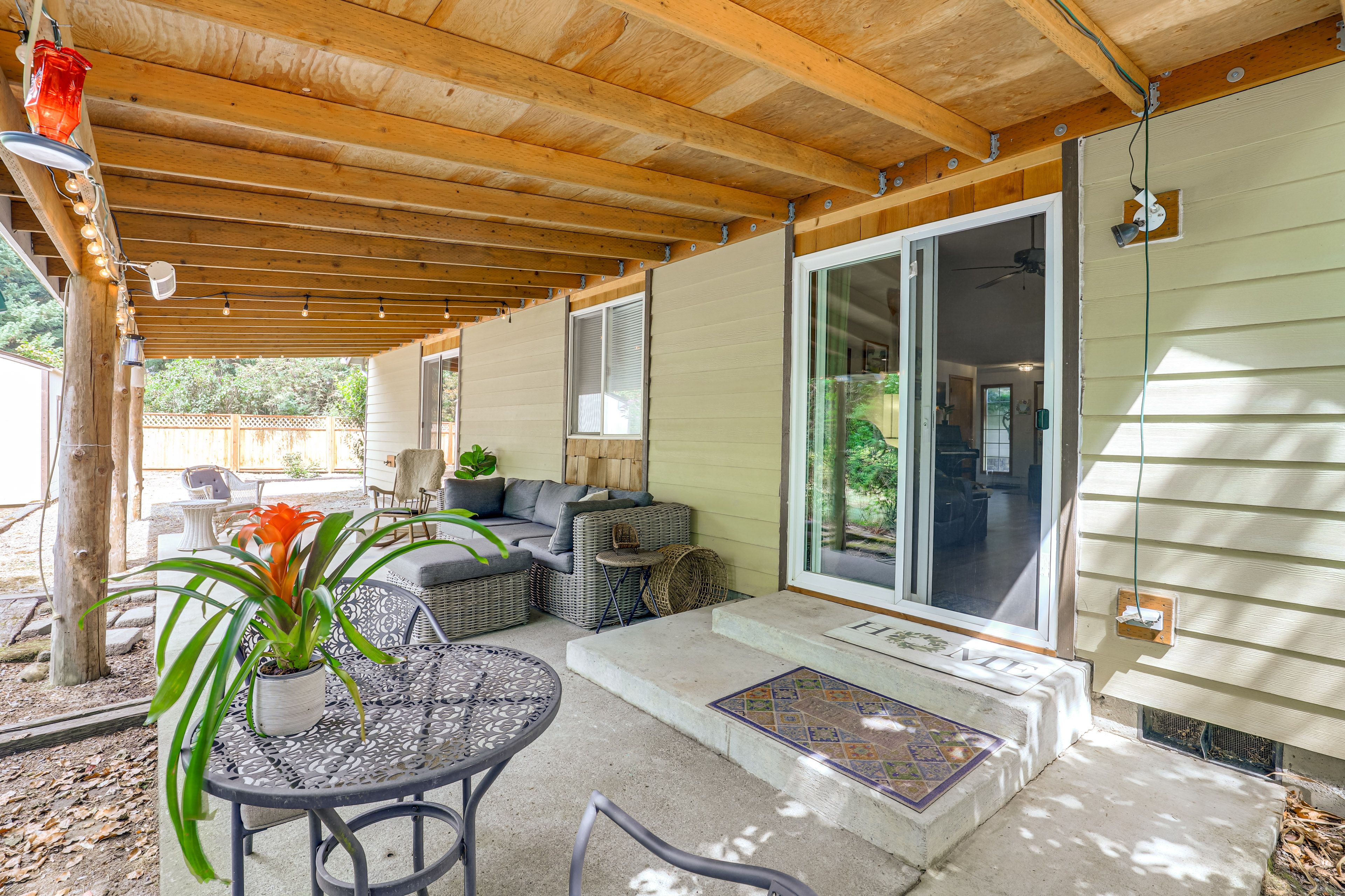 House Exterior | Covered Patio w/ Seating | Dining Area