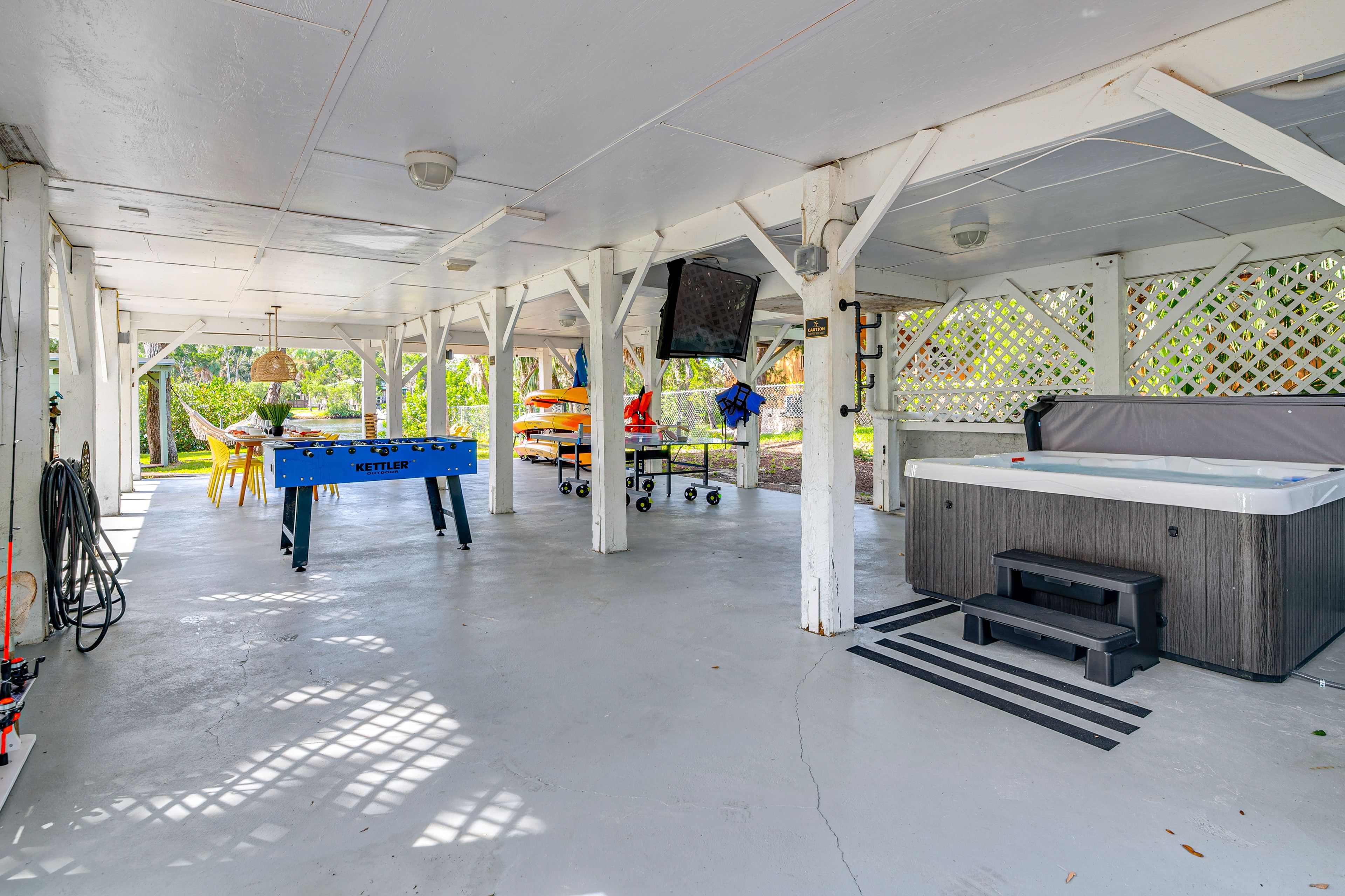 Covered Patio | Private Hot Tub | Flat-Screen TV | Outdoor Dining Area