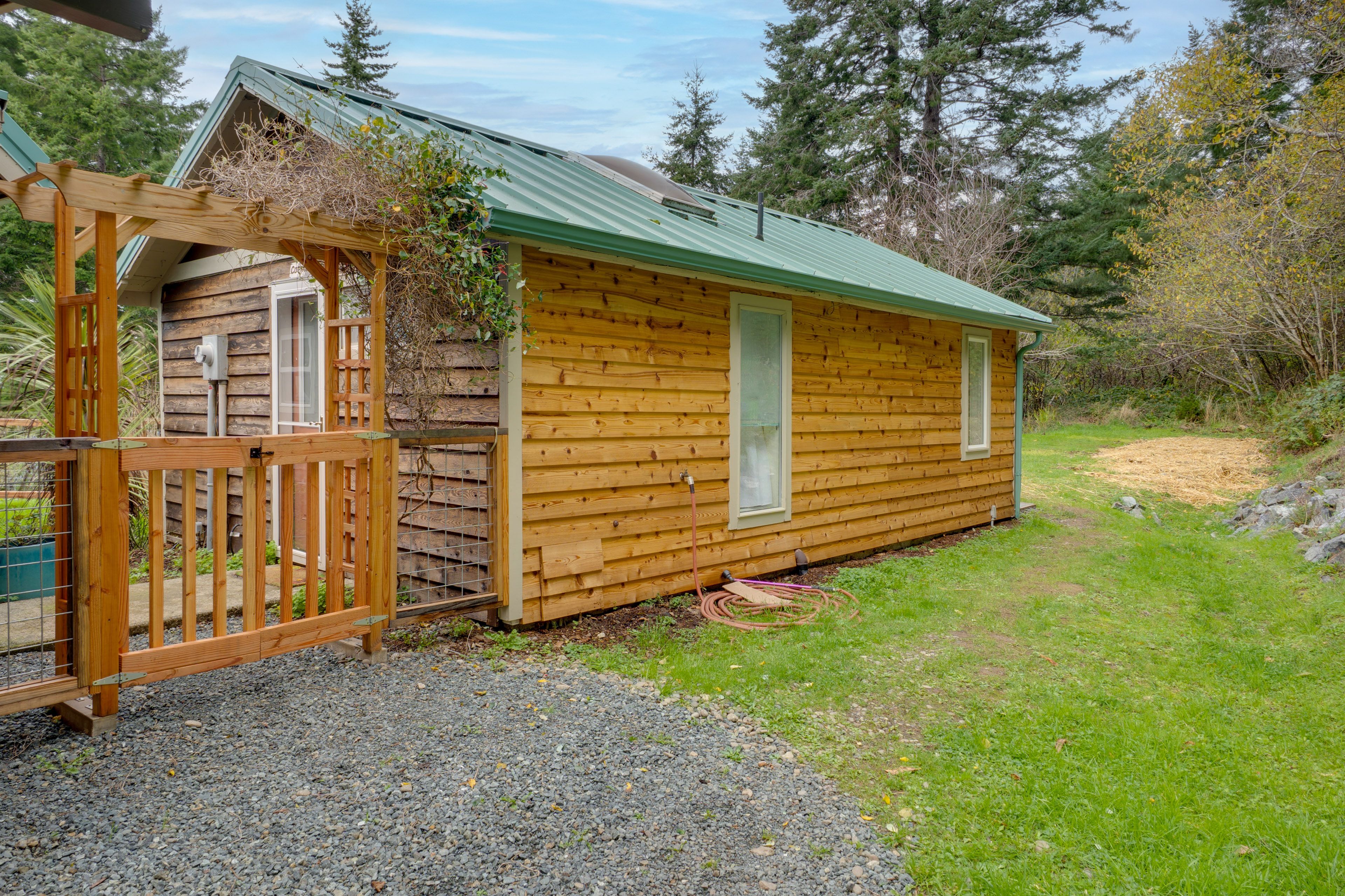 Studio Exterior | Entry | Parking | Designated Parking Area (1 Vehicle)