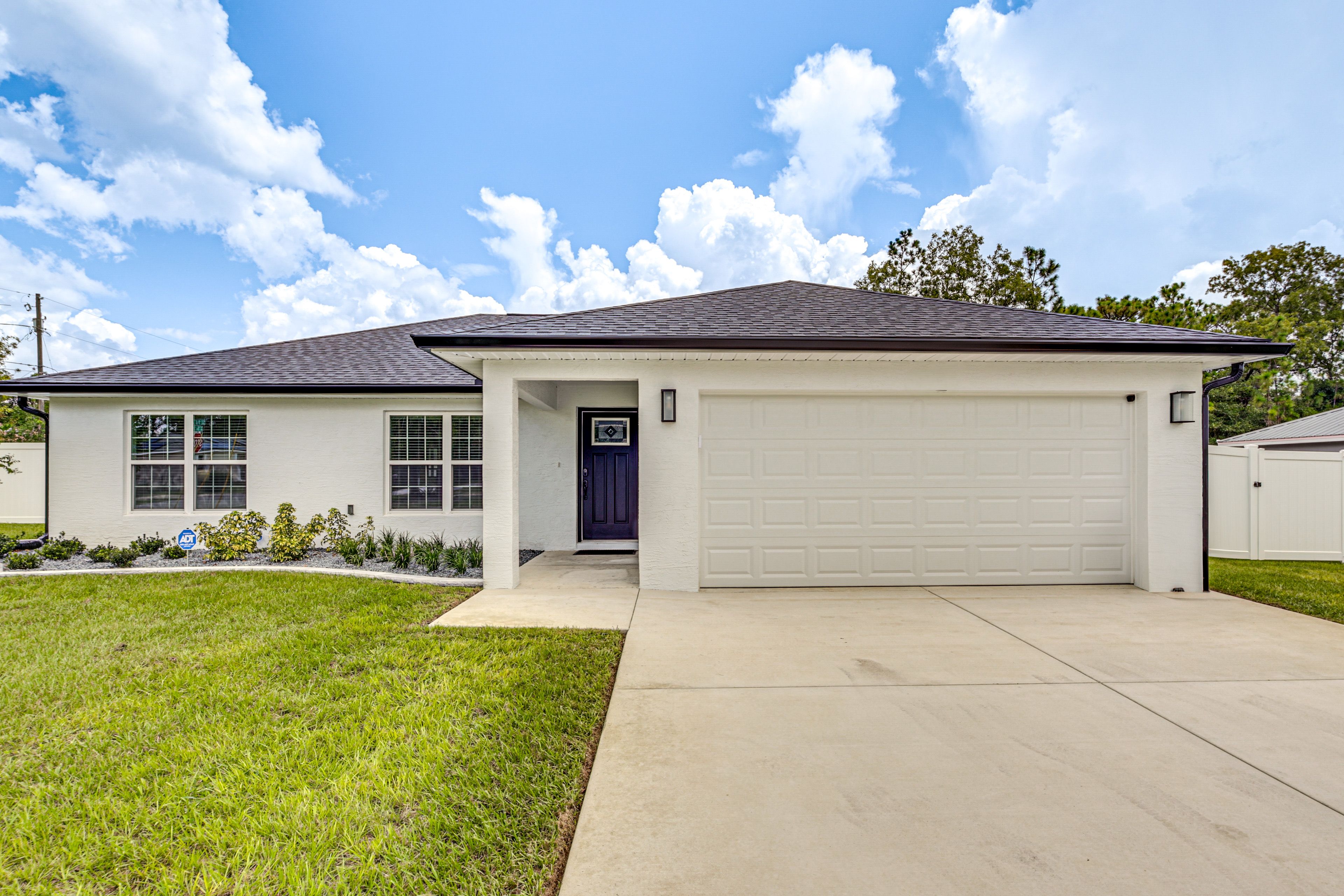 Front Exterior | Parking | Driveway (4 Vehicles)