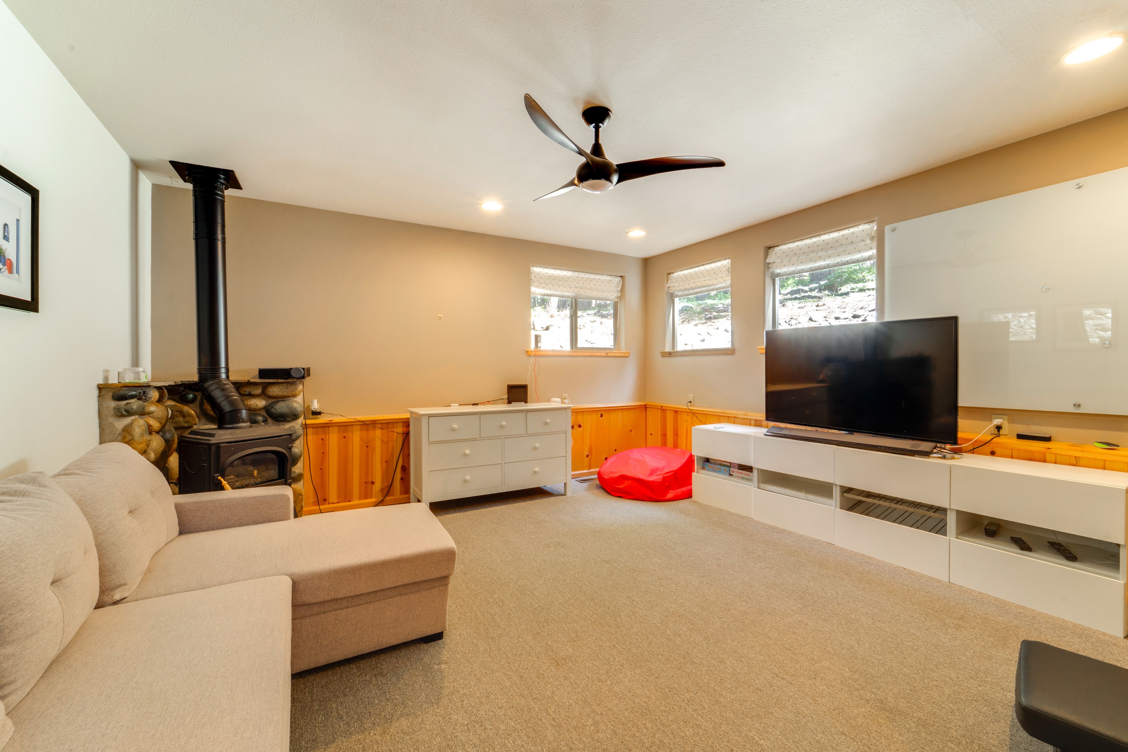 Den | Twin Sleeper Sofa | Decorative Wood-Burning Stove | Lower Level