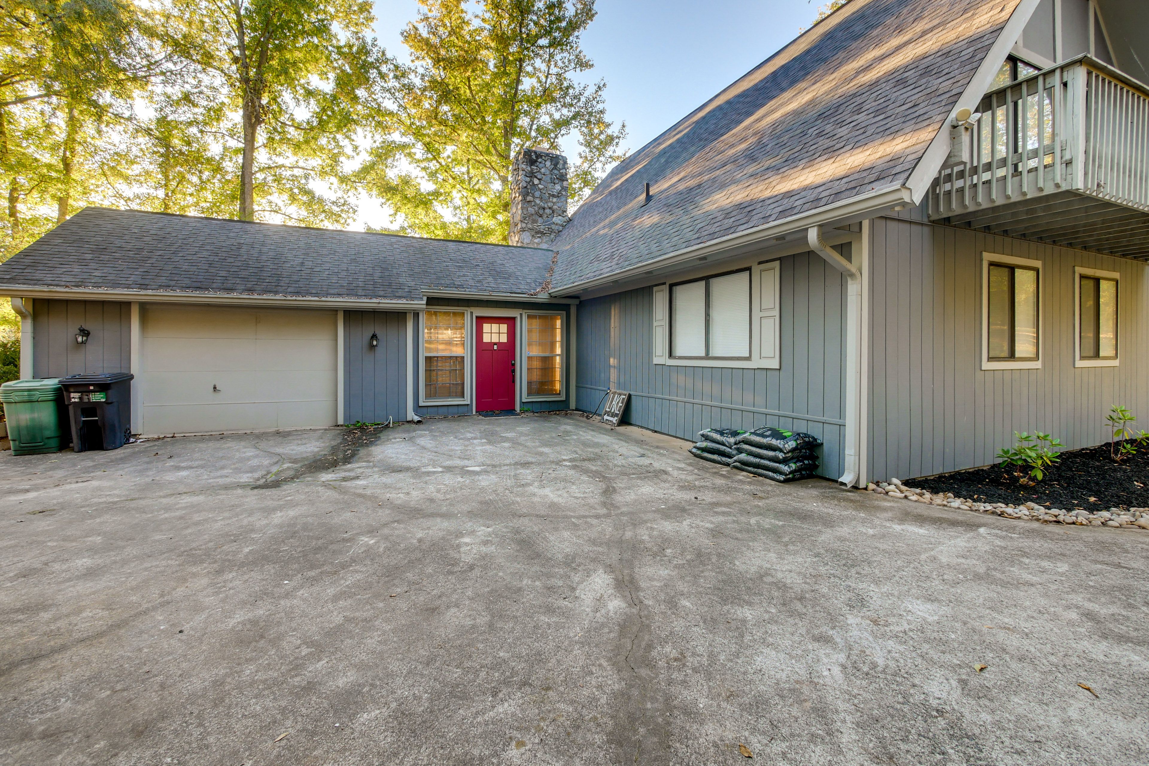 Property Exterior | Private Dock | Deck w/ Grill & Hot Tub | Spacious Yard