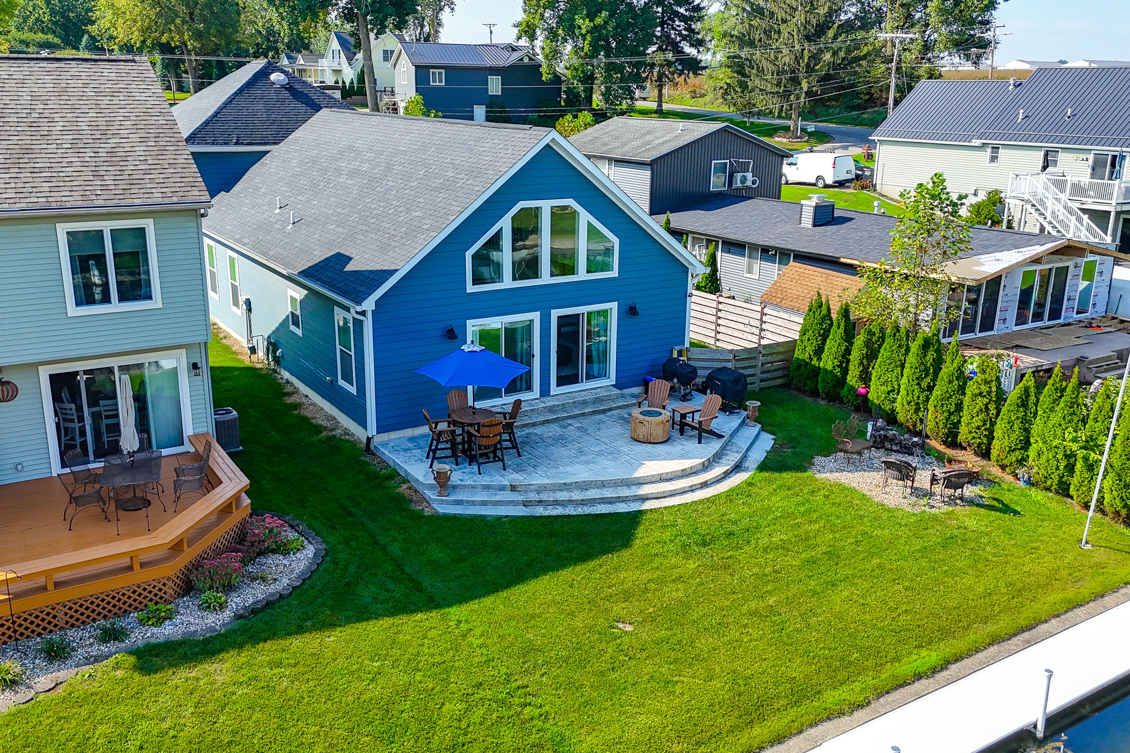 House Exterior | Dining Area | Flat Top & Charcoal Grills | Private Backyard