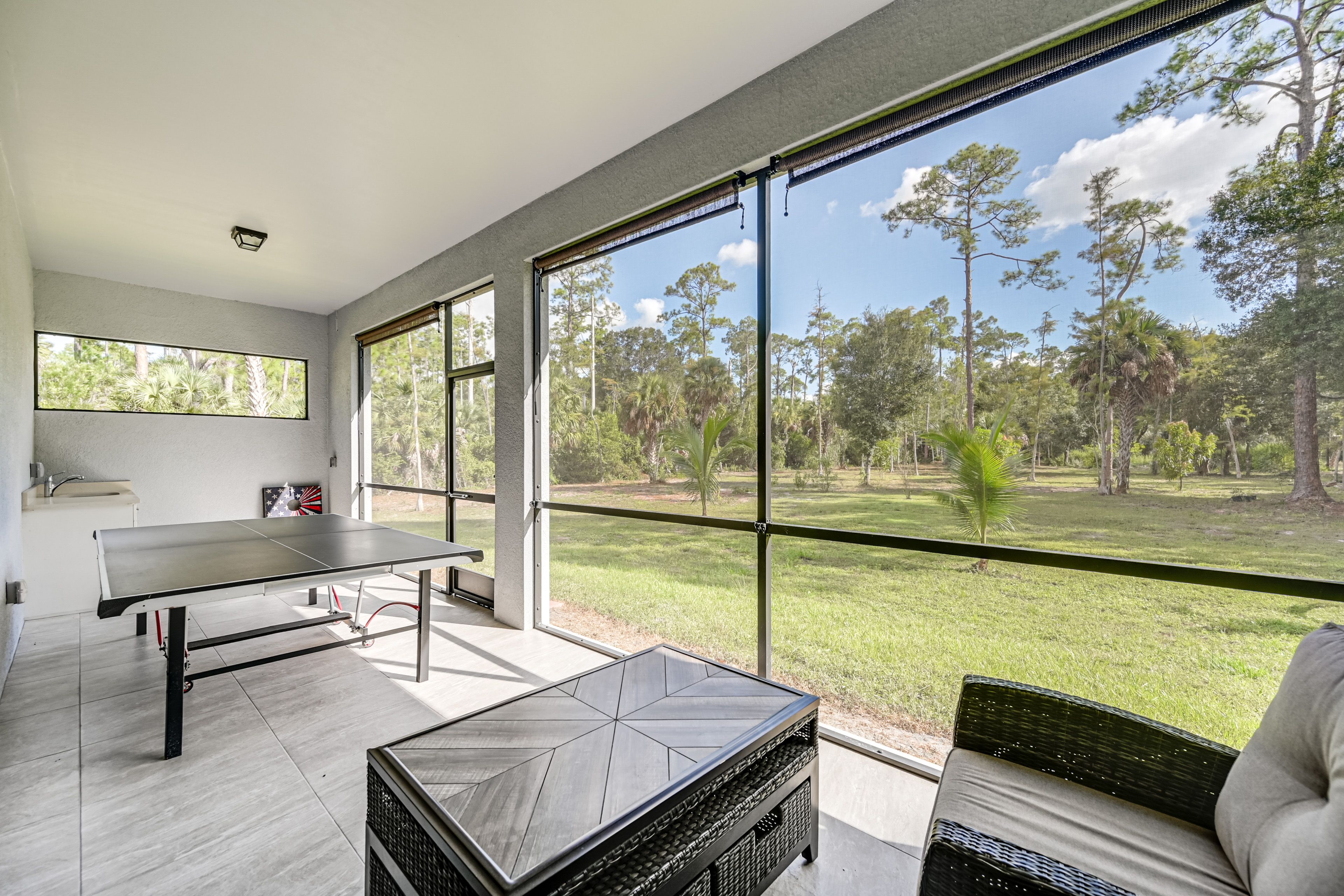 Screened-In Lanai | Ping-Pong Table | Seating