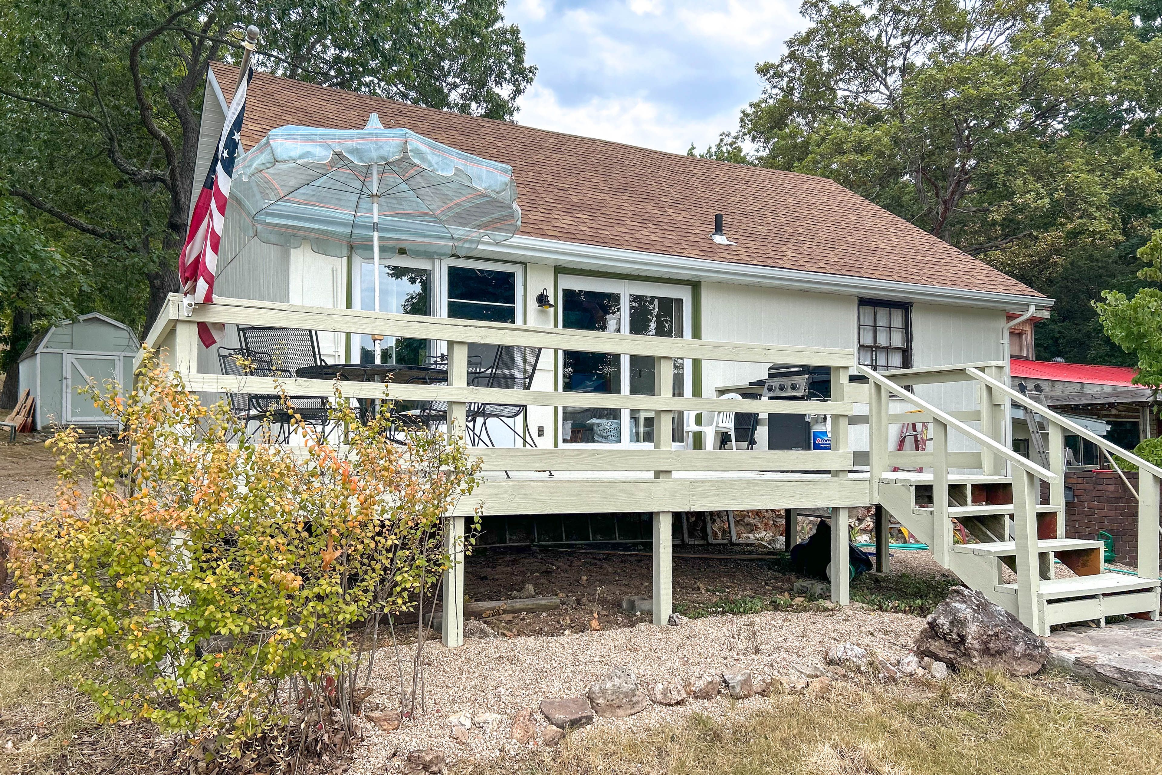 House Exterior | Deck | Dining Area w/ Umbrella | Gas Grill