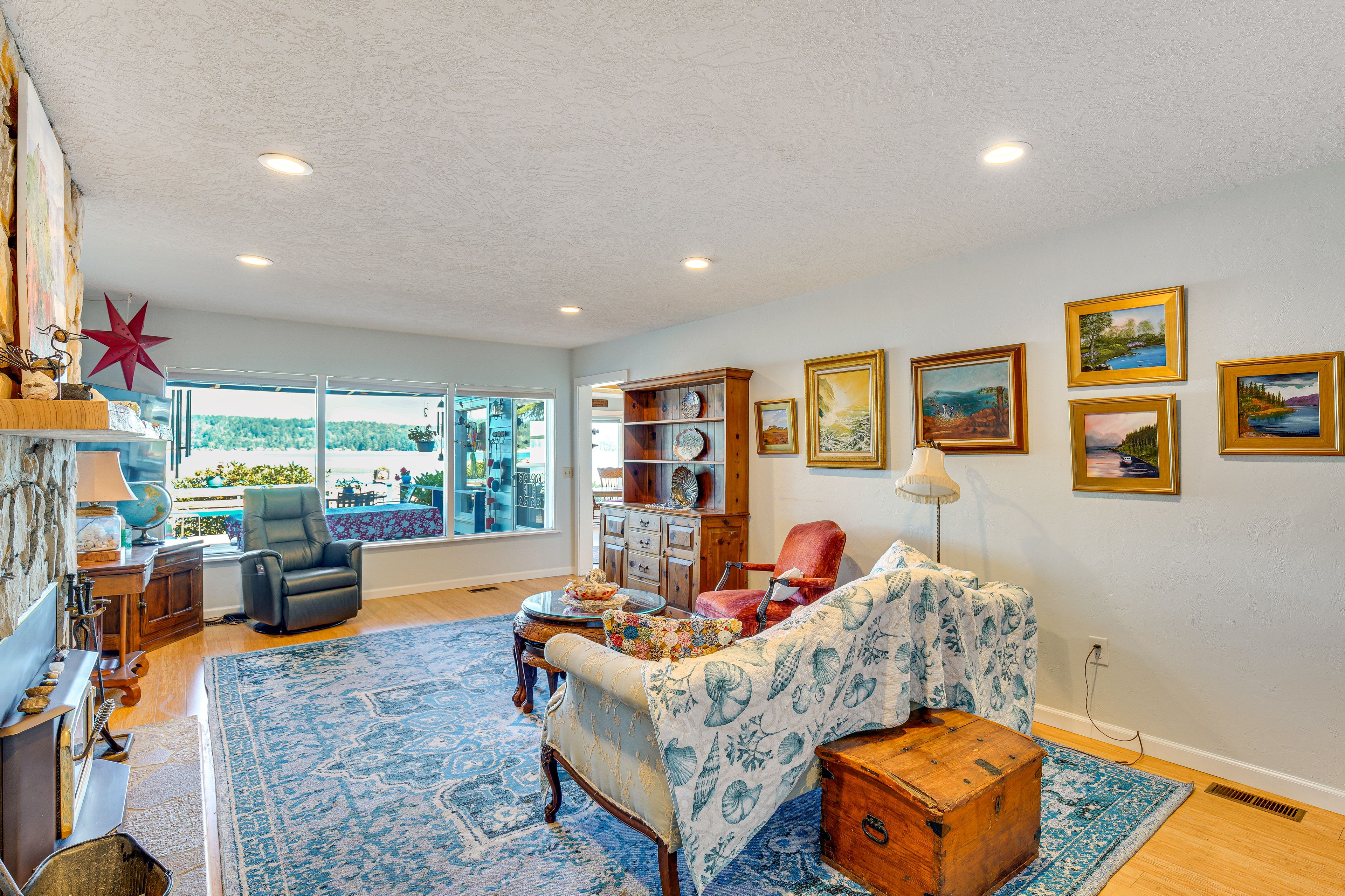 Living Room | Water & Mountain Views | Single-Story Home | Central A/C & Heating