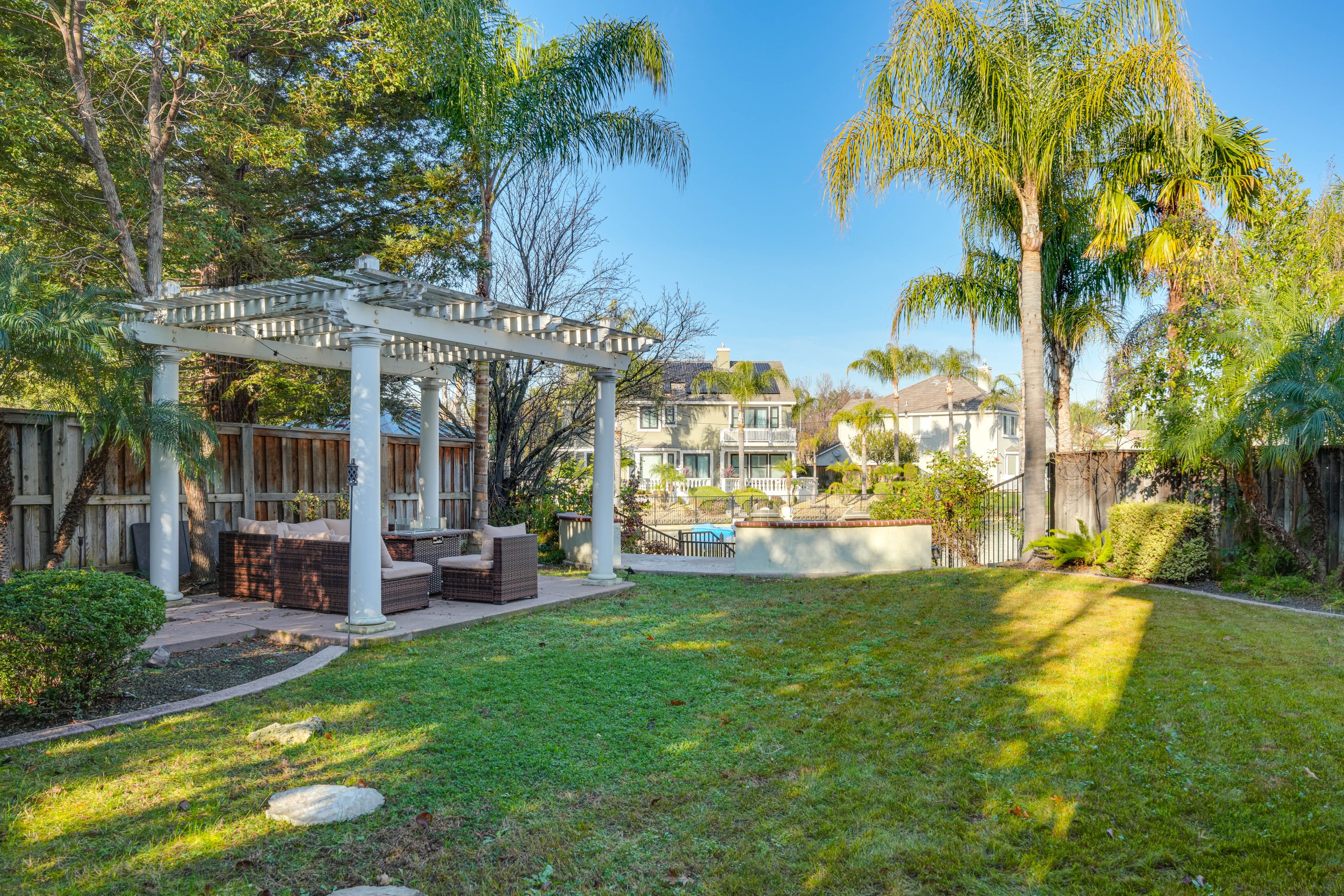 Fenced-In Backyard | Fire Table | Waterfront Seating Area