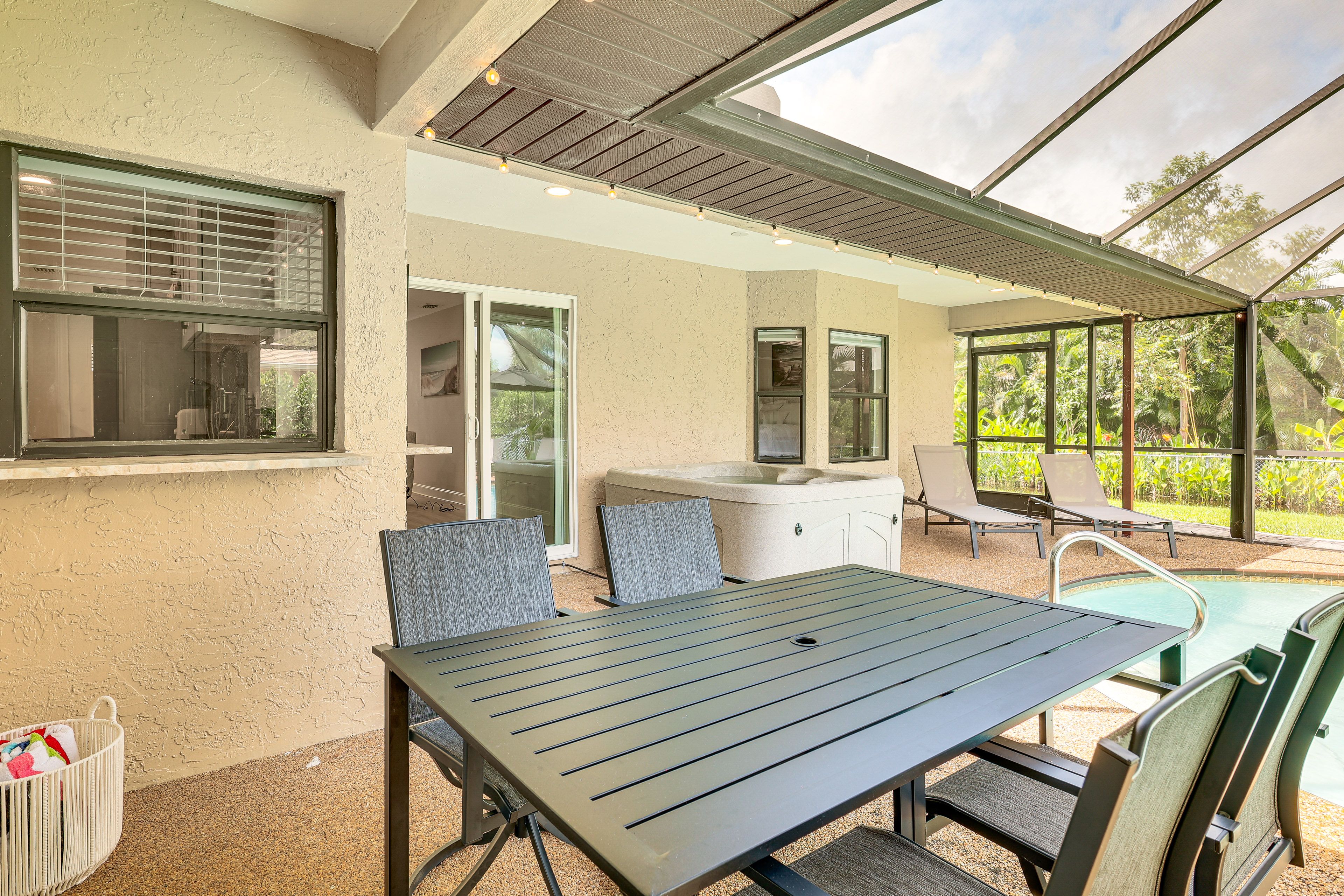 House Exterior | Furnished Lanai | Dining Area | Smart TV