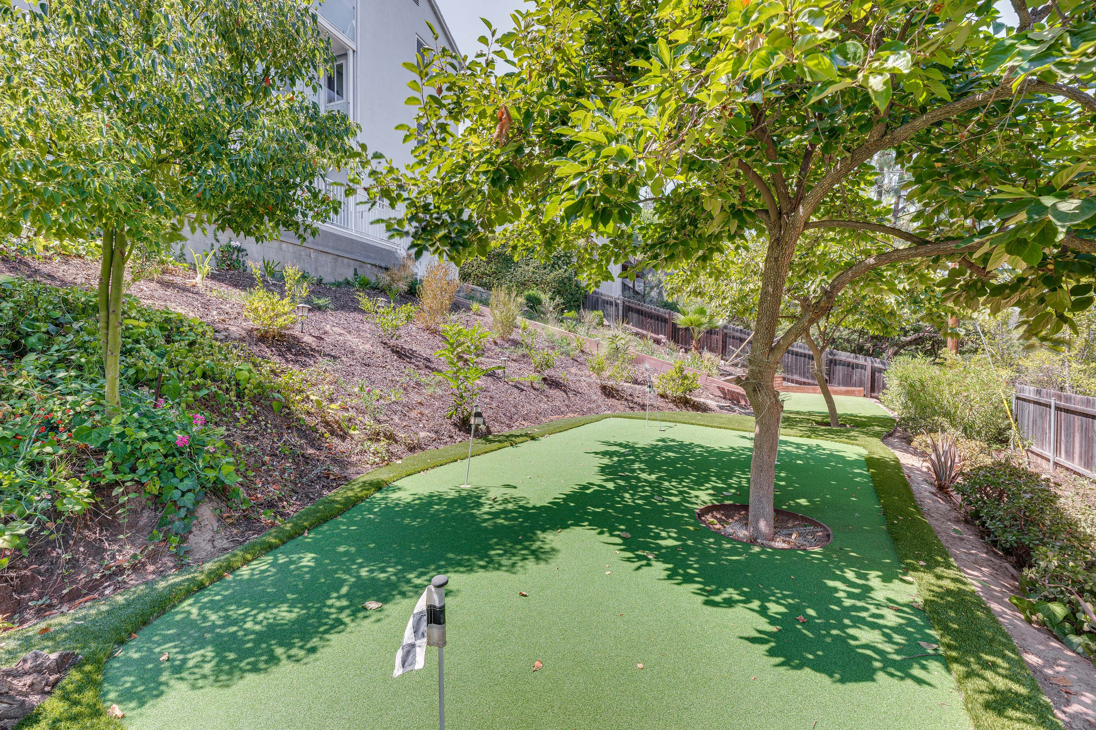 Putting Green | Mountain & City Views | Patio w/ Dining Table