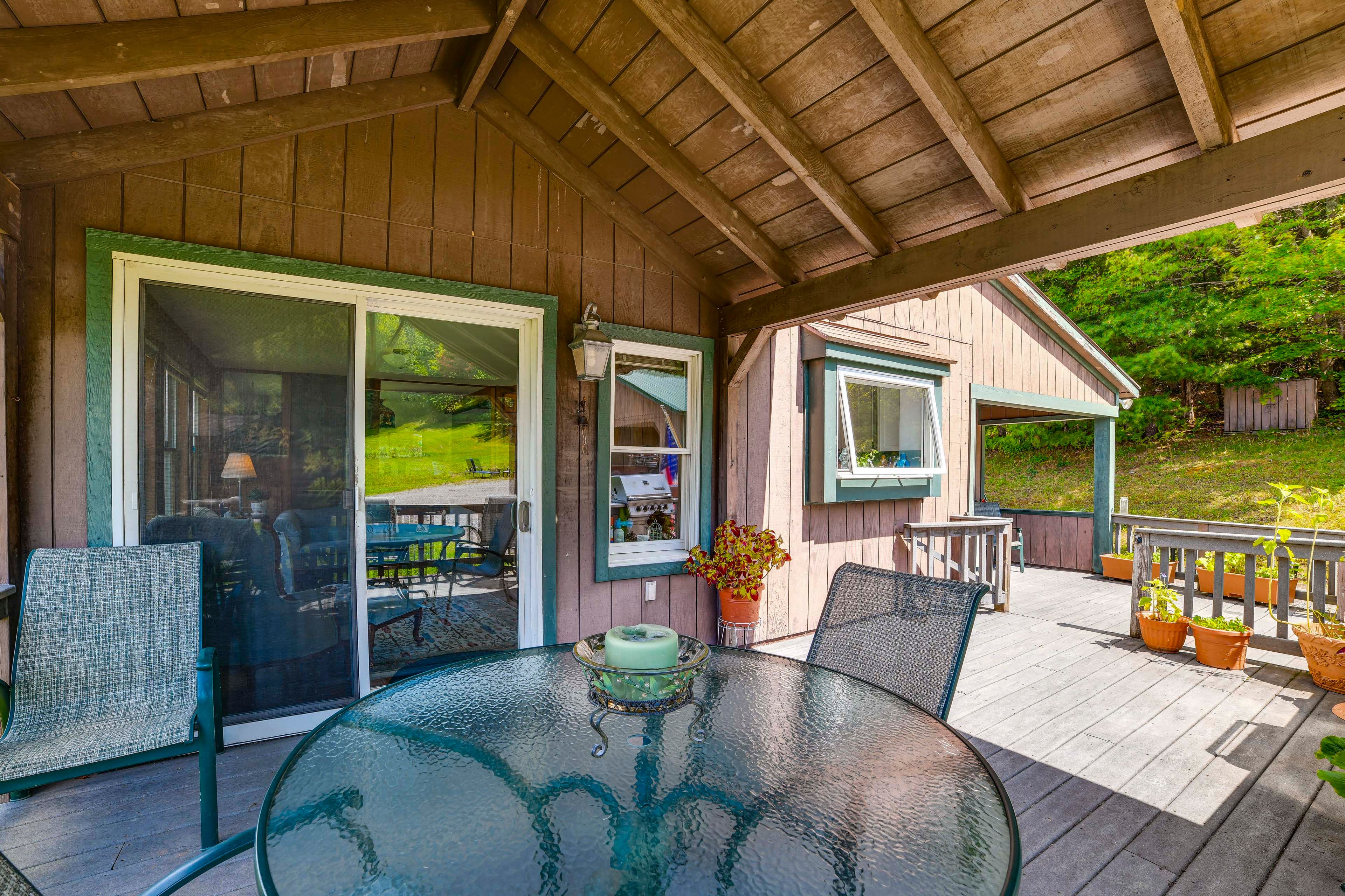 House Exterior | Covered Deck w/ Seating | Dining Area | Gas Grill