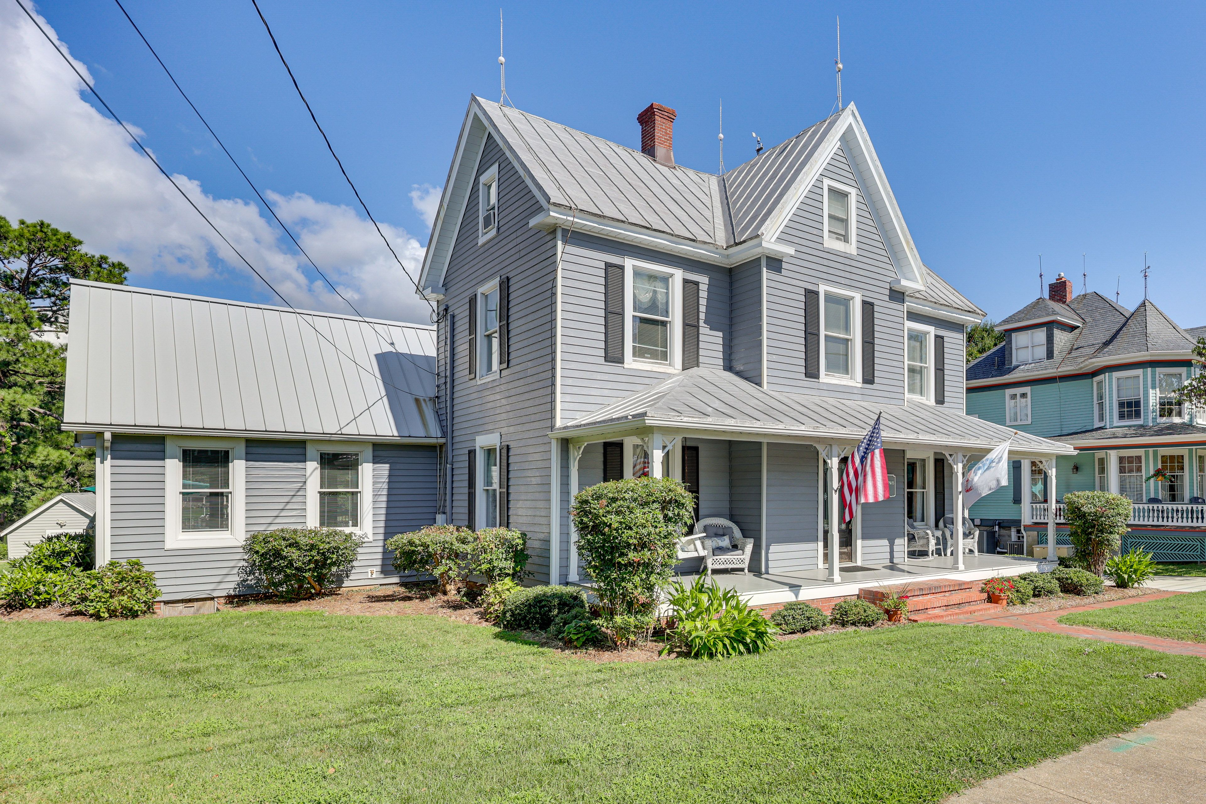 Property Exterior | 3-Story Home | Furnished Front Porch