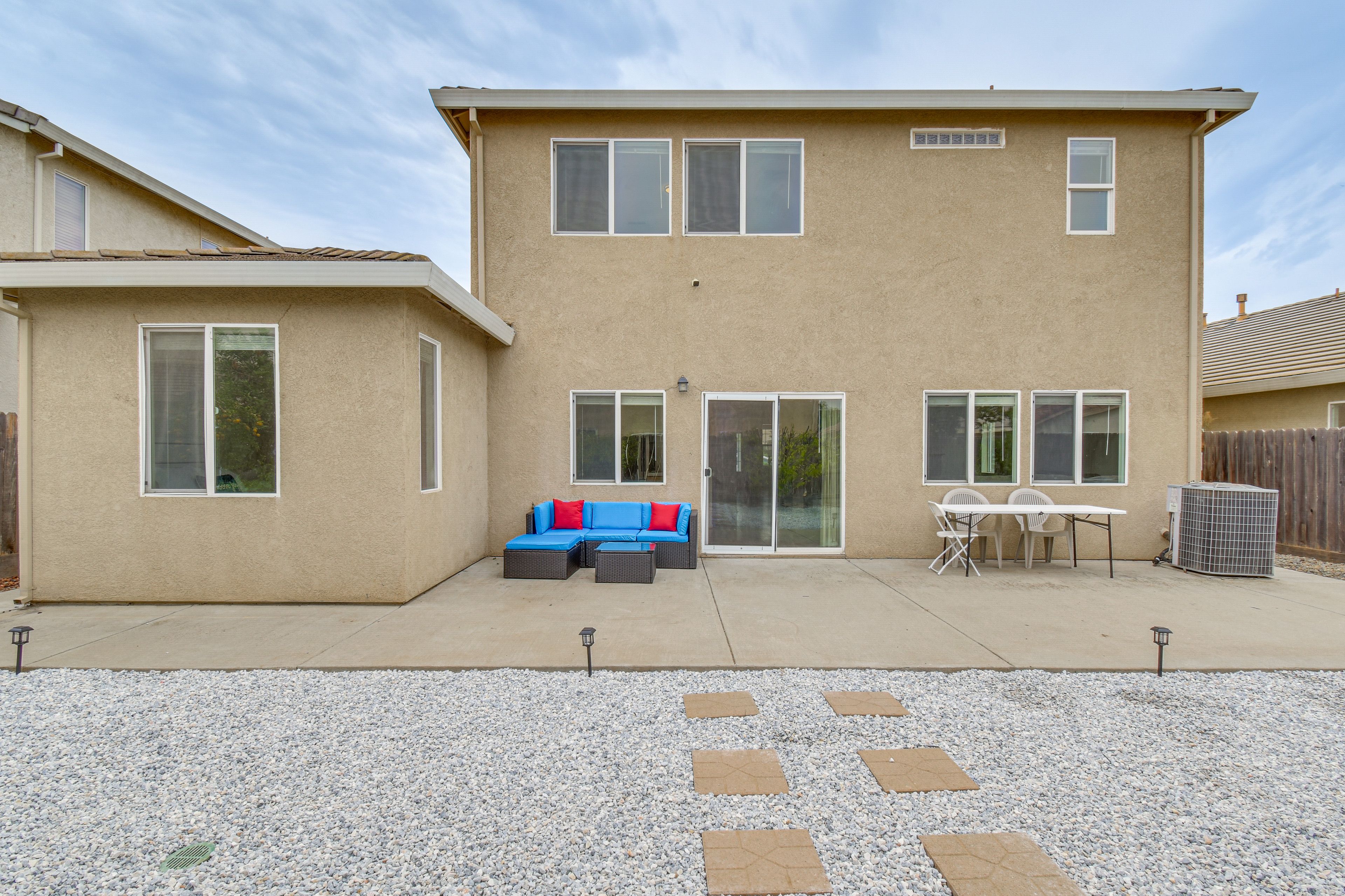 Property Exterior | Private Yard | Furnished Patio