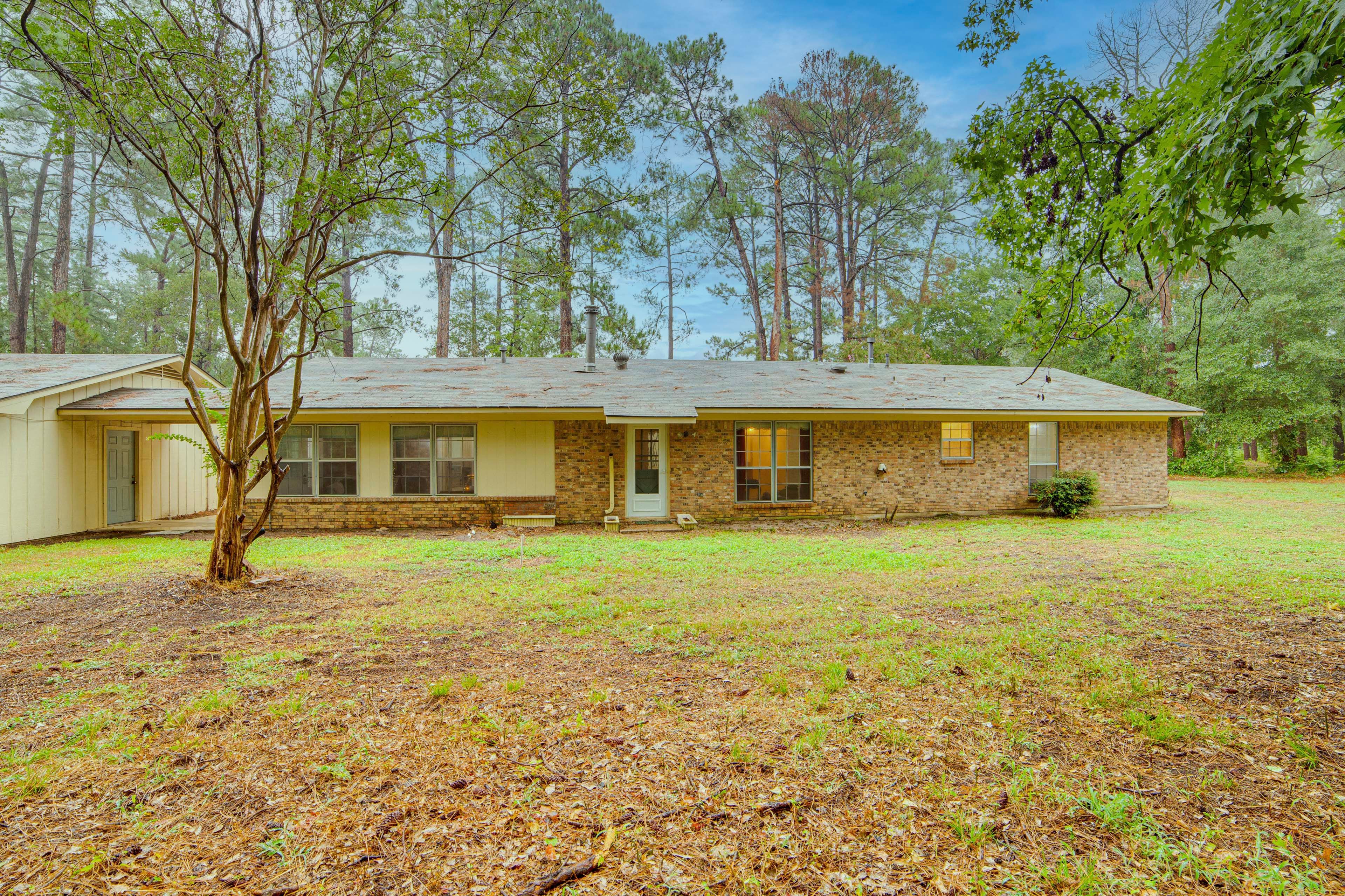 Property Exterior | Spacious Yard