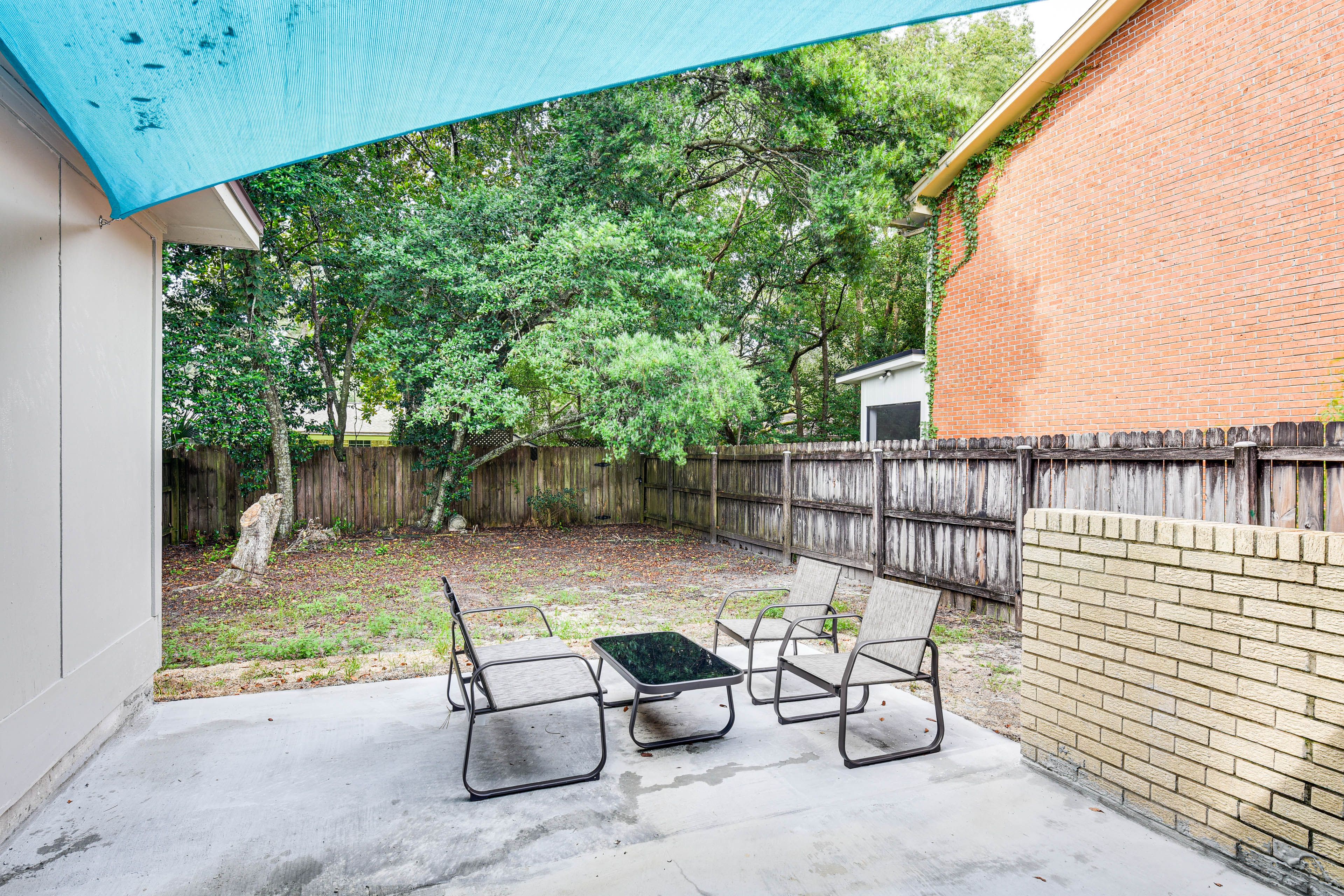 Exterior | Private Patio | Outdoor Seating | Fenced Yard | Grill