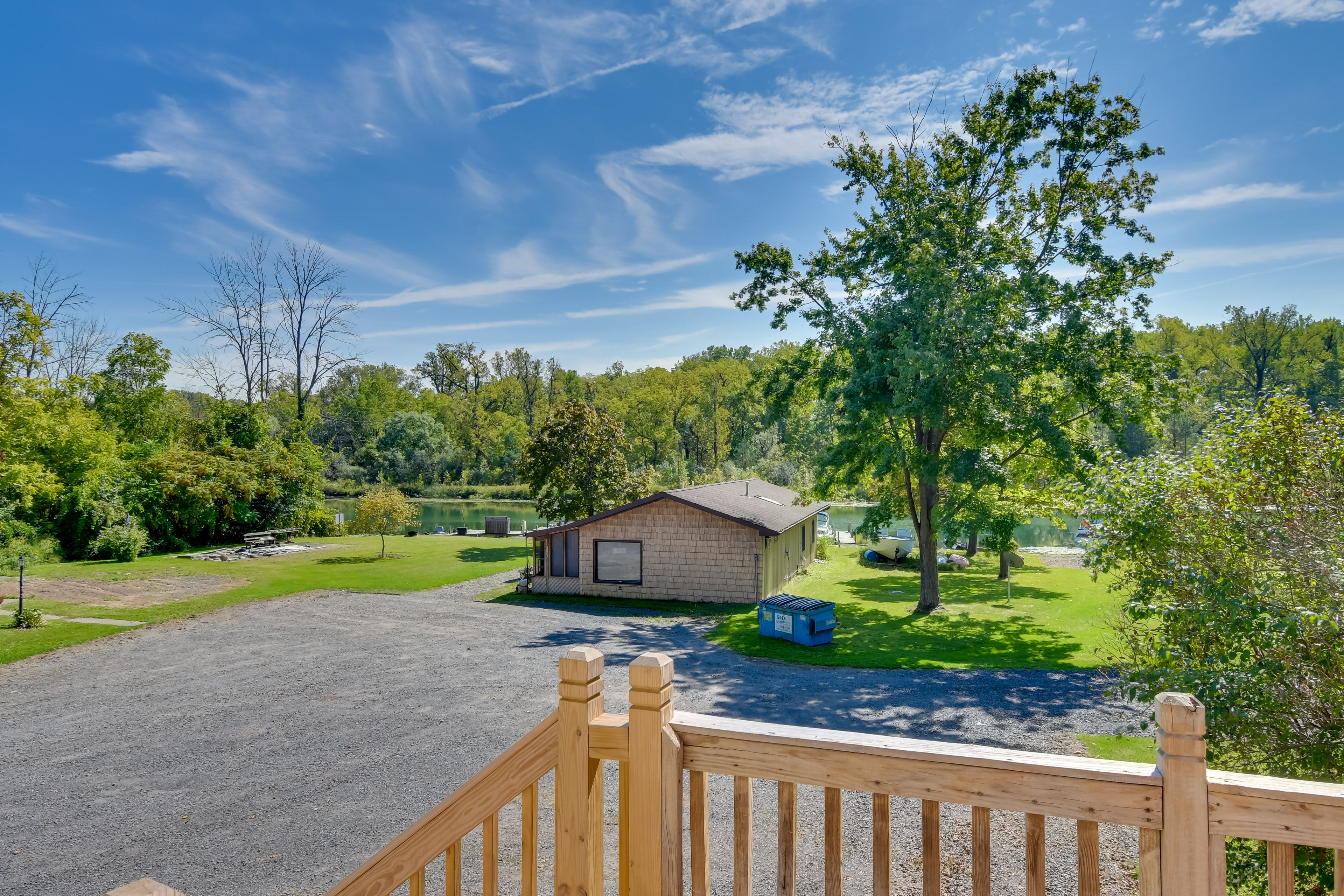 Apartment Exterior | Furnished Deck | River Views