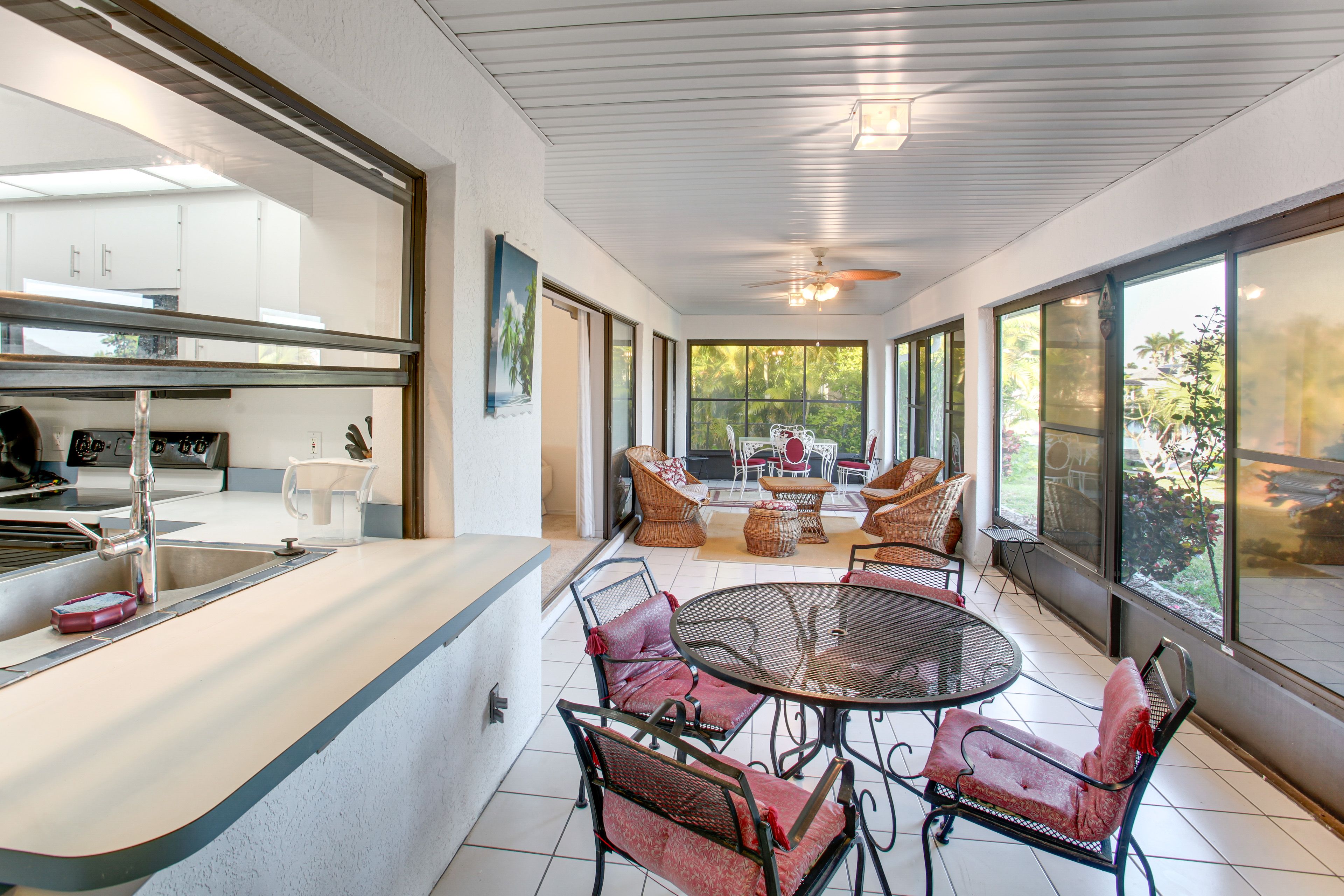 Sunroom | Dining & Lounge Areas | Canal Views