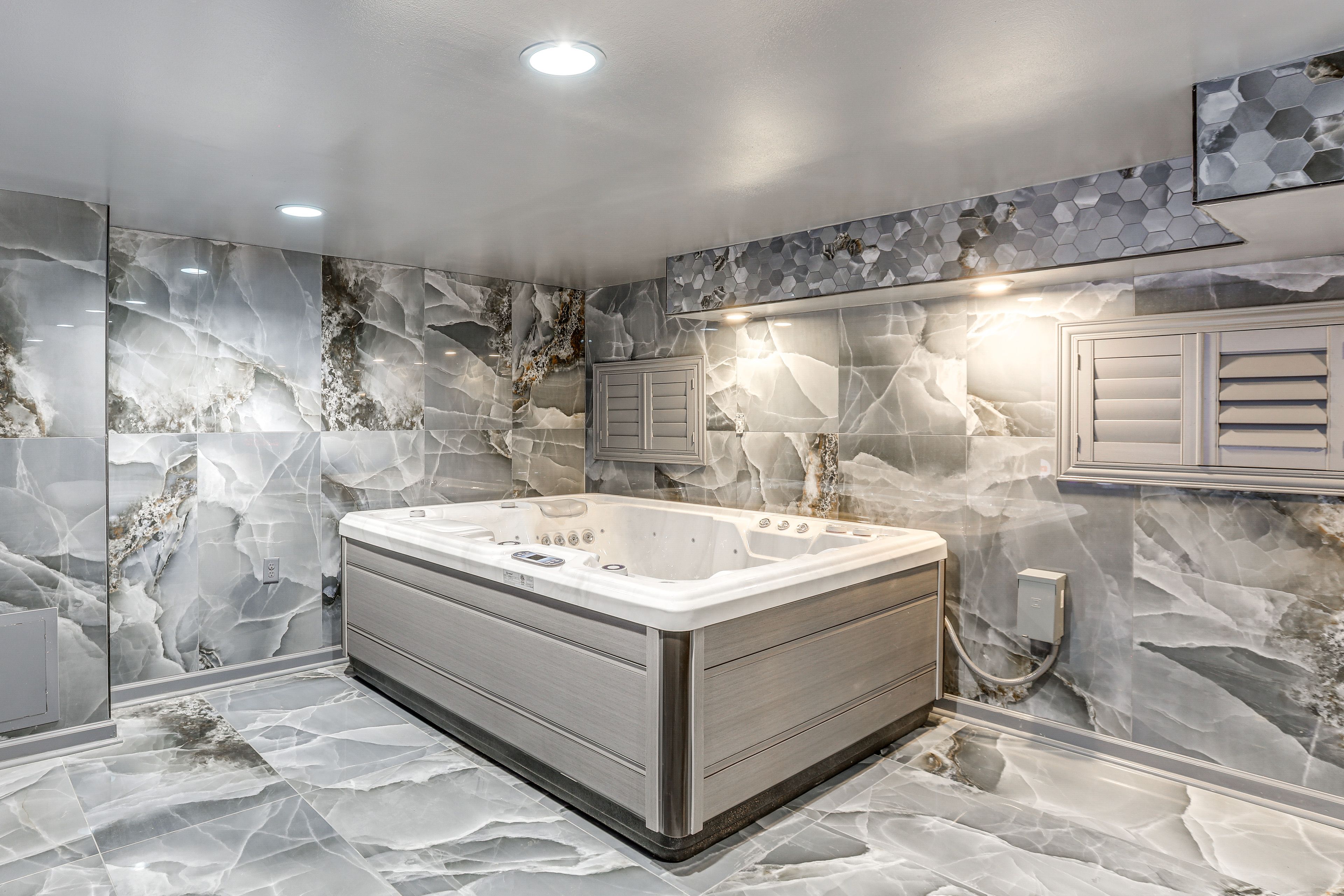 Bedroom 1 (The Blue Room) | Lower Level | 4-Seat Hot Tub