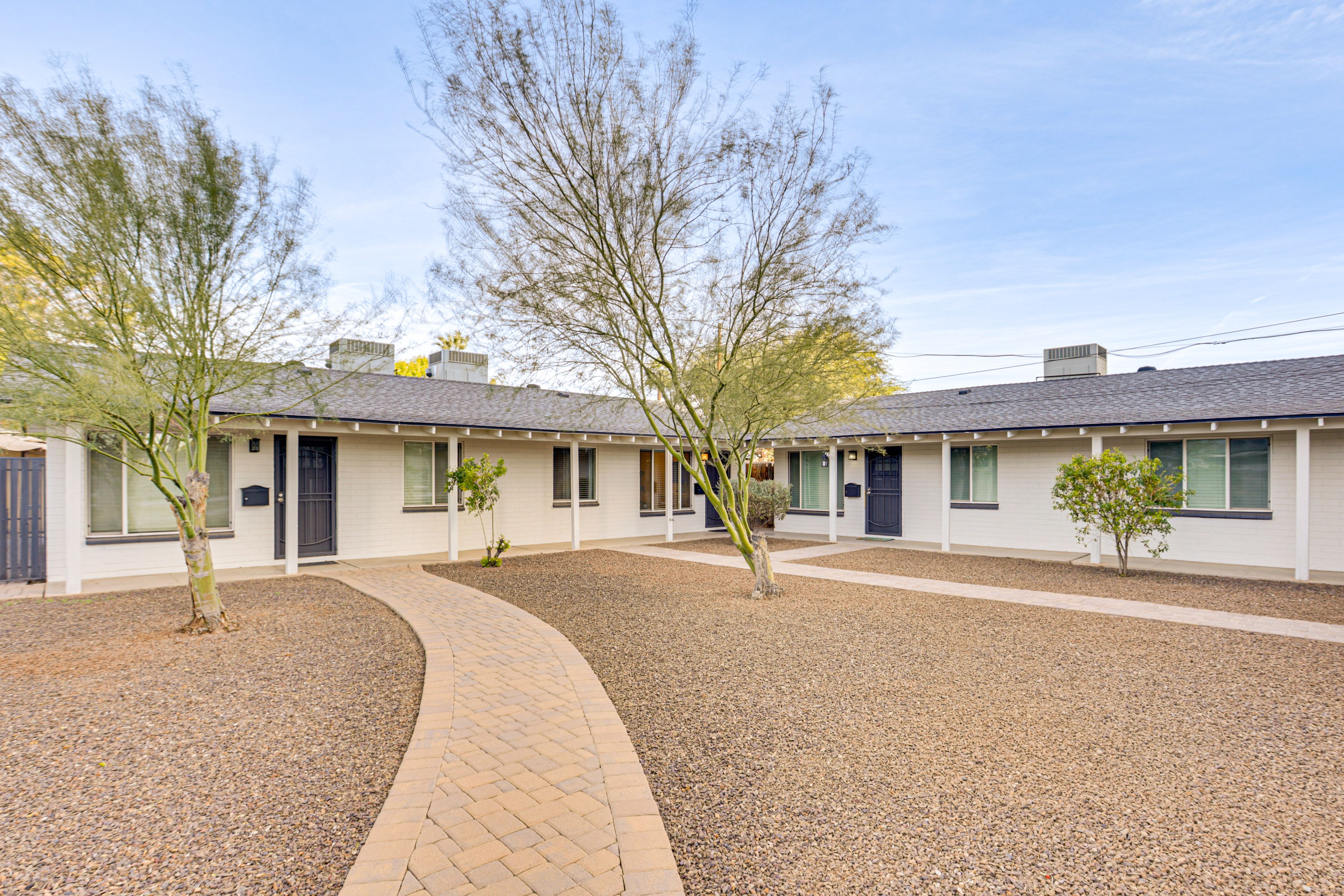 Building Exterior | Courtyard | Single-Story Condo