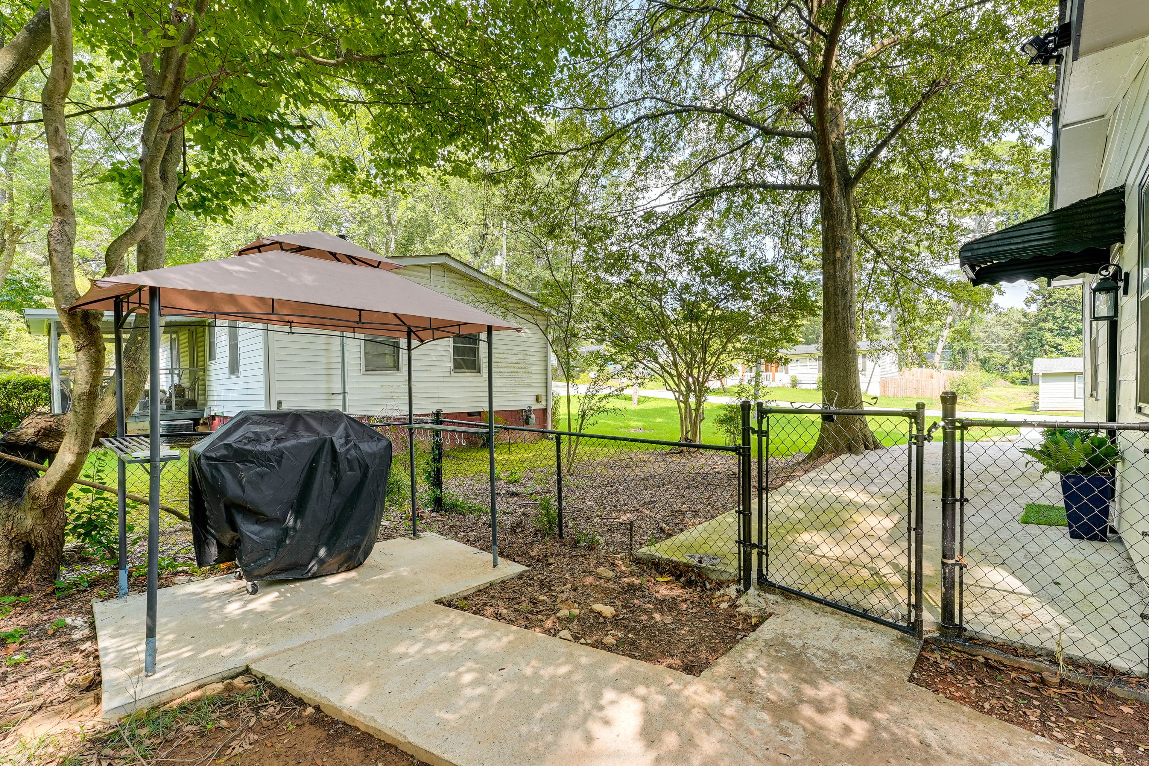 House Exterior | Covered Gas Grill