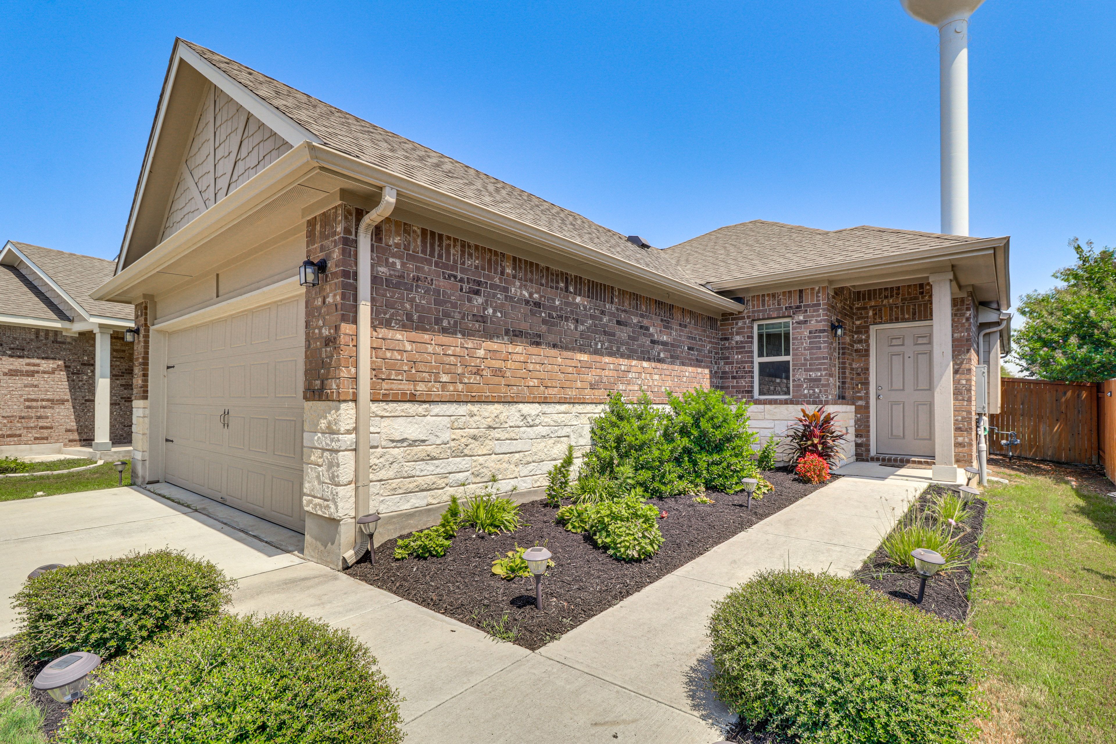 Exterior | Driveway (2 Vehicles) | Garage (2 Vehicles)