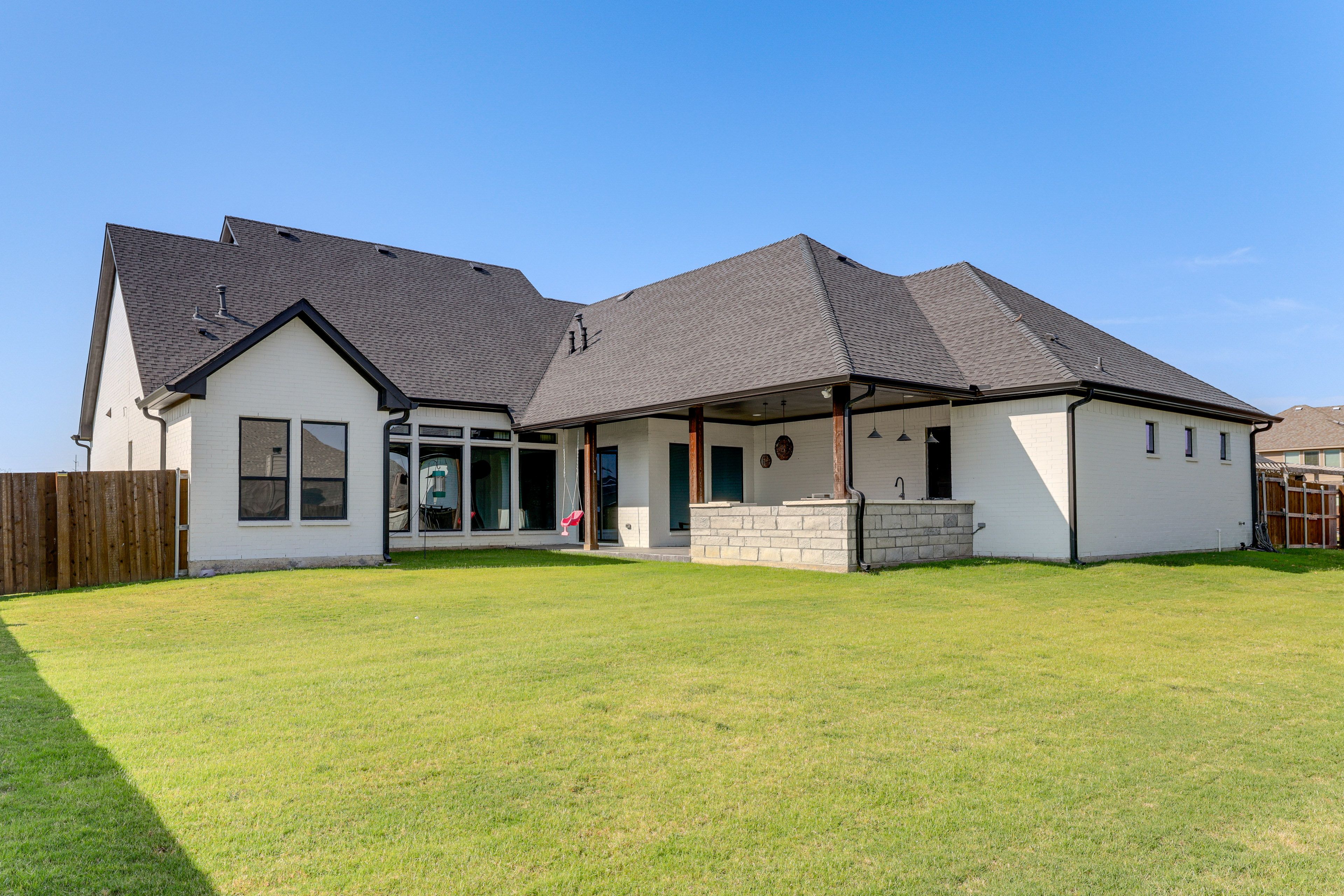 House Exterior | Covered Patio | Fenced Backyard