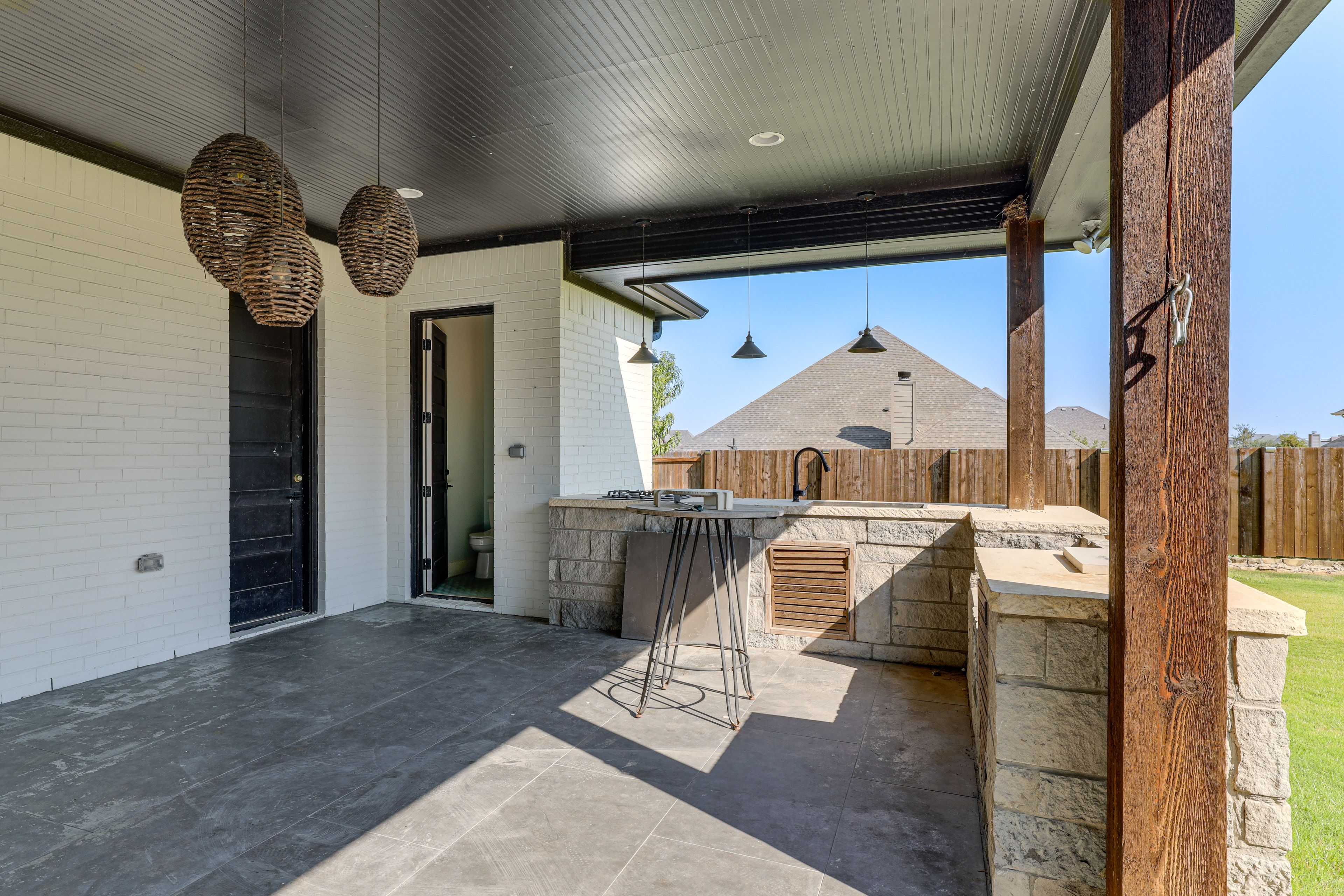 House Exterior | Kitchen w/ Sink & Gas Range