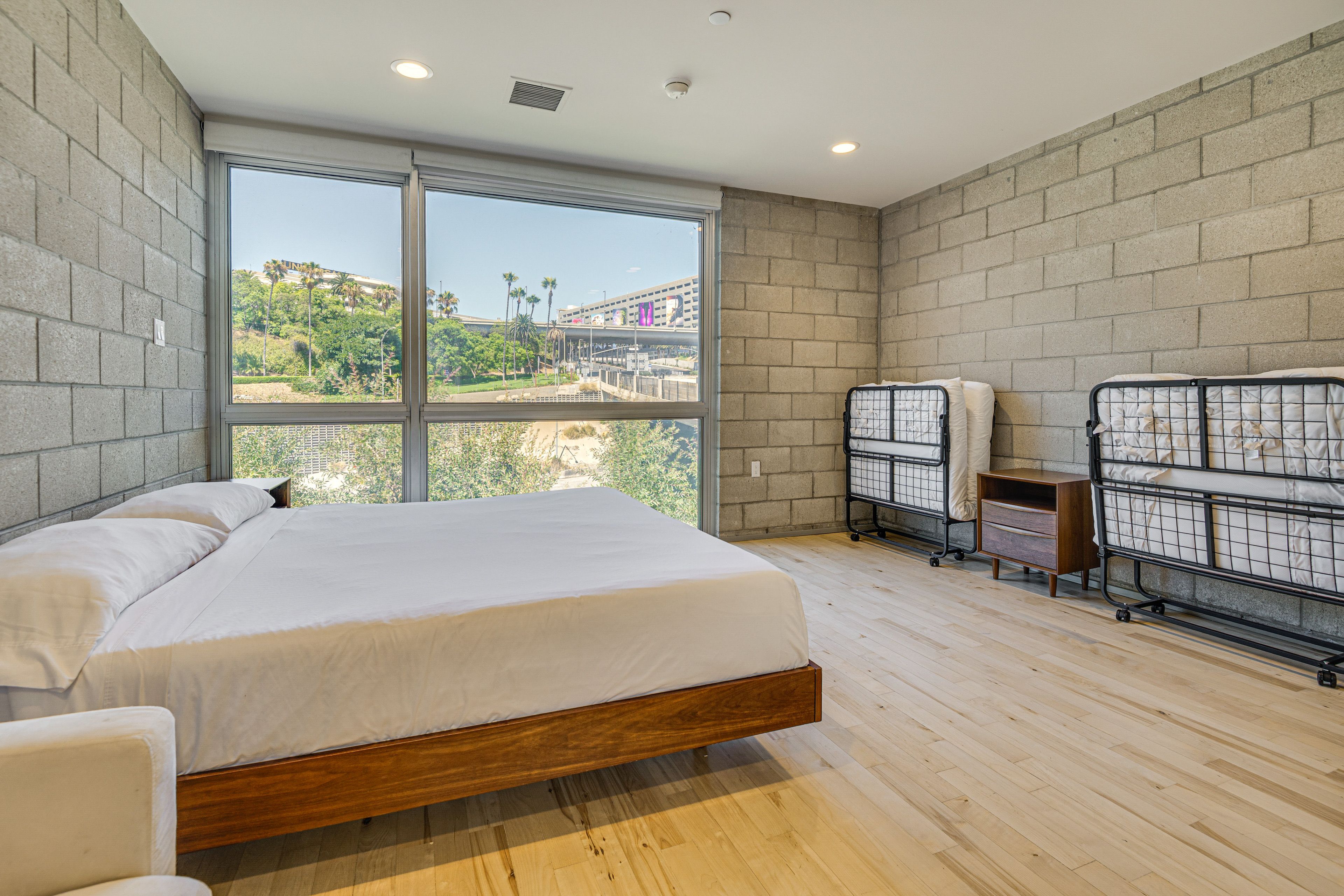 Bedroom 1 | King Bed | Full Futon | 2 Twin Rollaway Beds | 3rd Floor