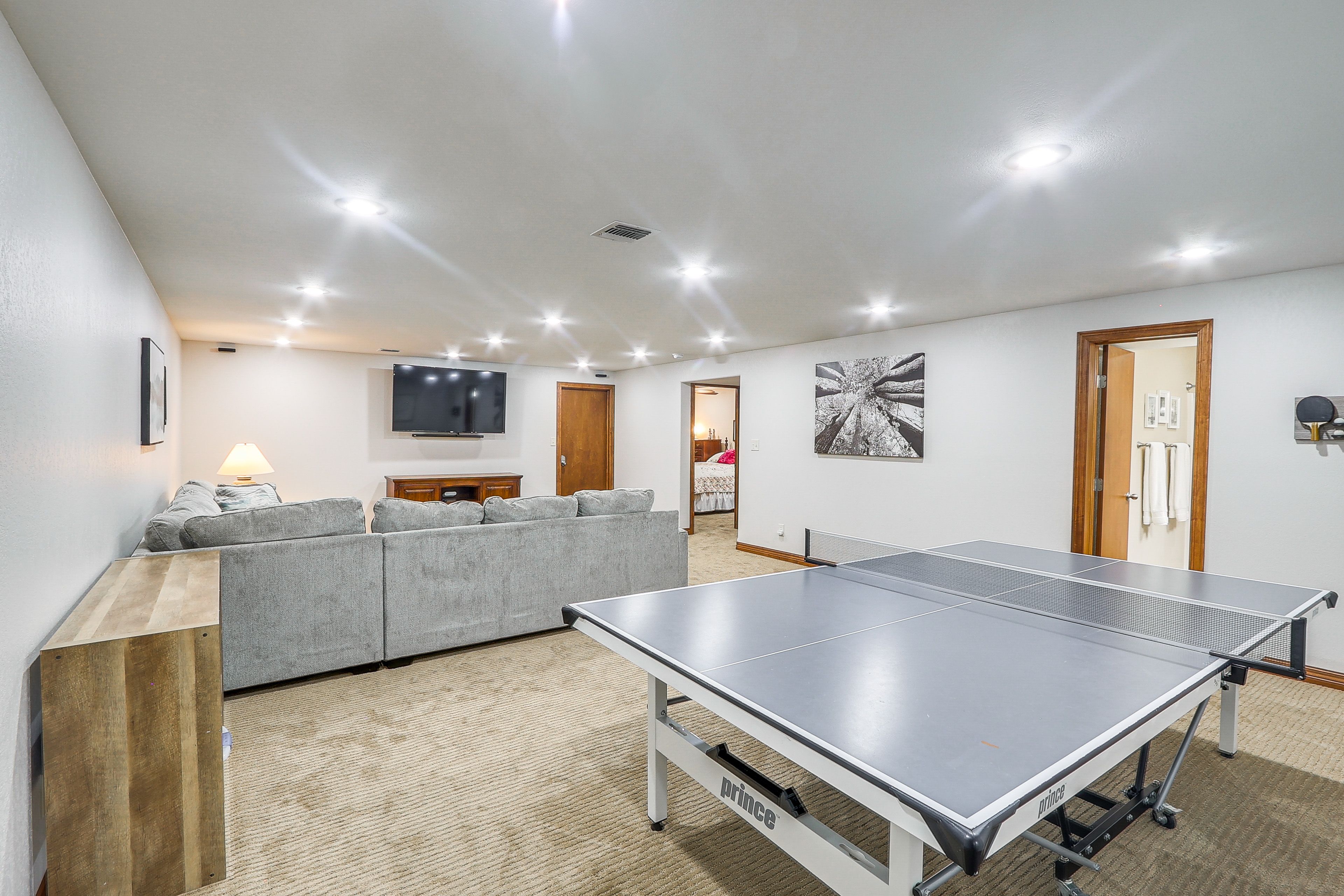 Lower Living Area | Ping-Pong Table | 65" Flat-Screen TV | Basement